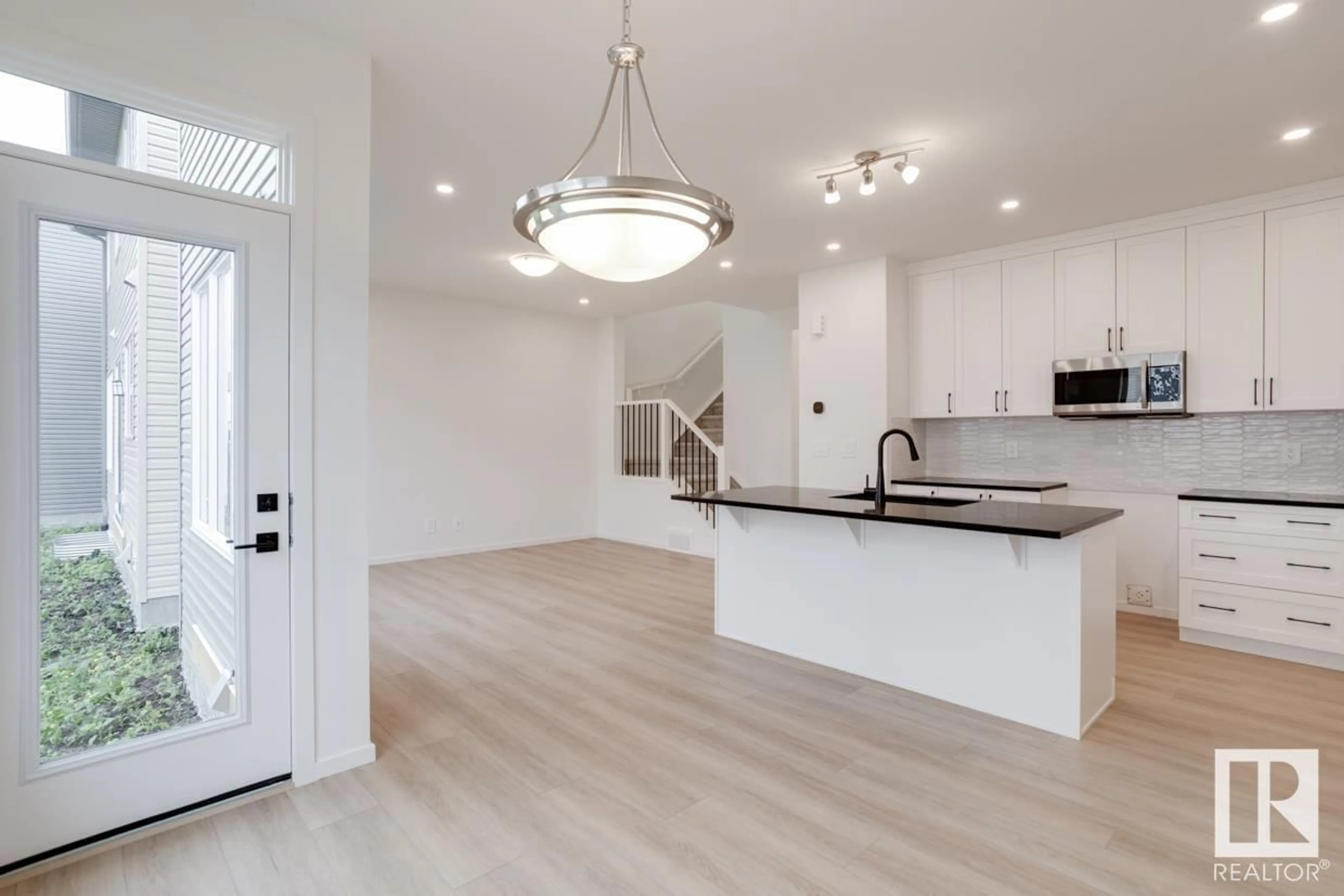 Open concept kitchen, unknown for NW - 2112 209 ST, Edmonton Alberta T6M2X6