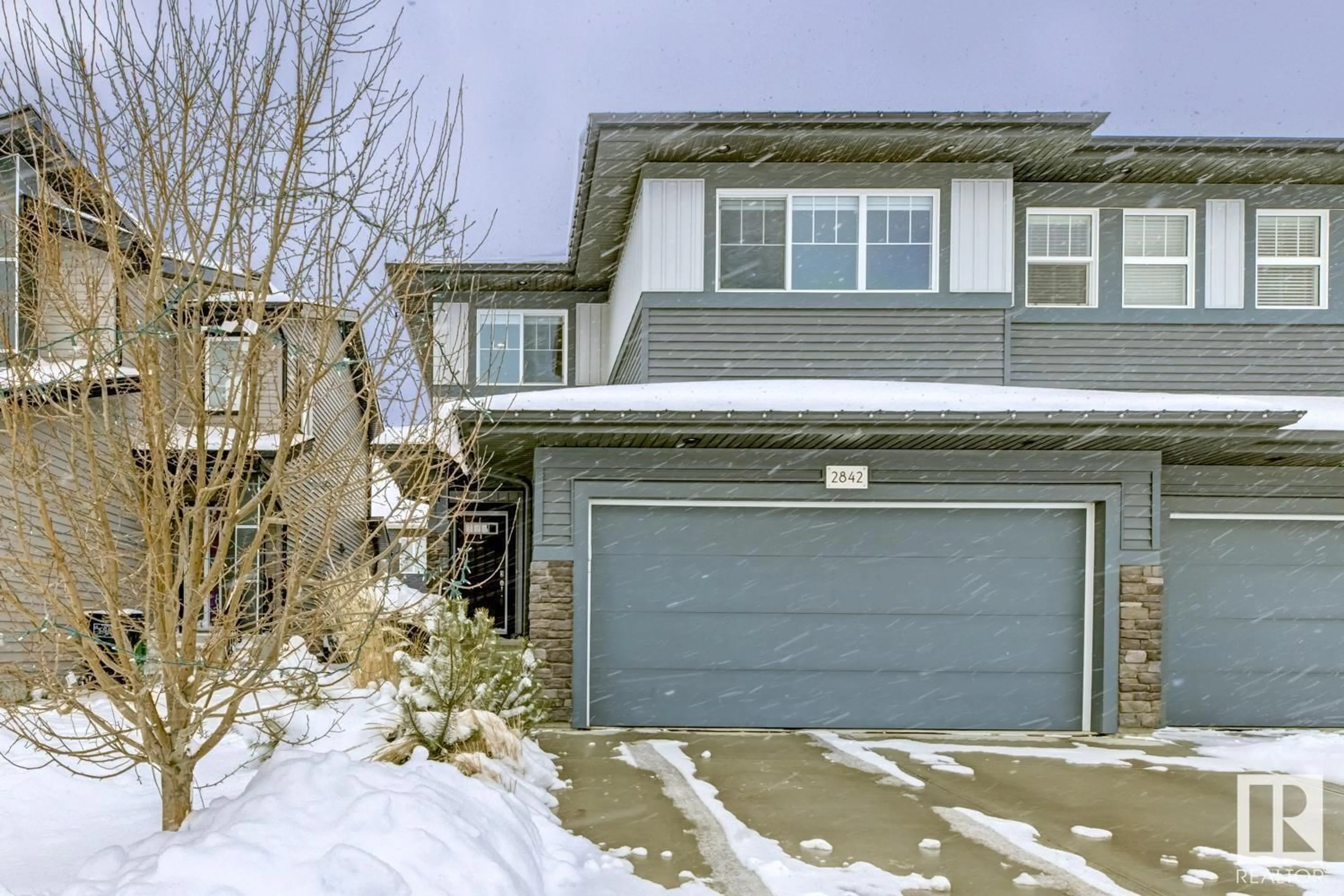 A pic from outside/outdoor area/front of a property/back of a property/a pic from drone, street for 2842 KOSHAL CR, Edmonton Alberta T6W3J7