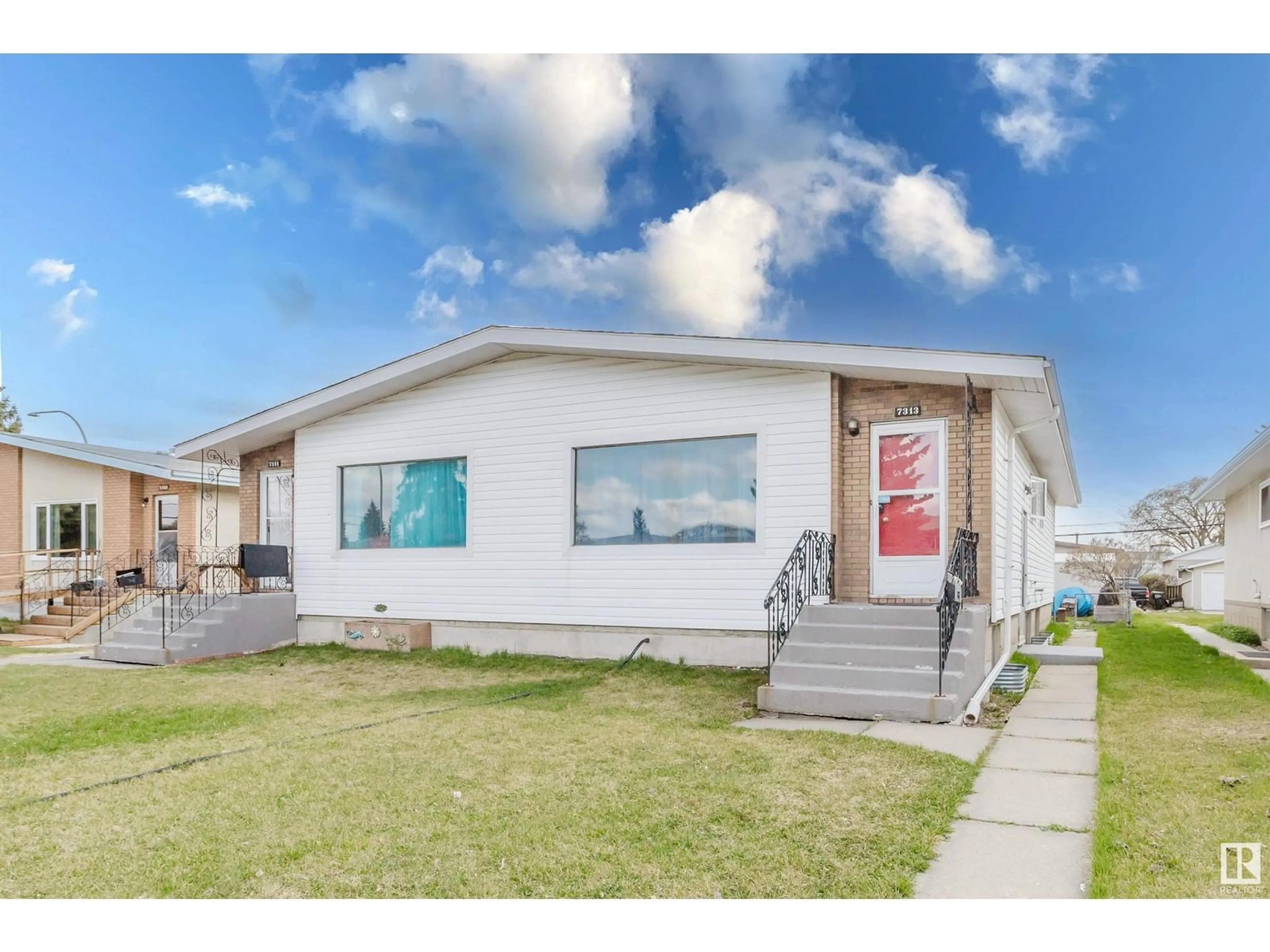 Home with vinyl exterior material, building for NW - 7311 7313 79 AV, Edmonton Alberta T6B0C4
