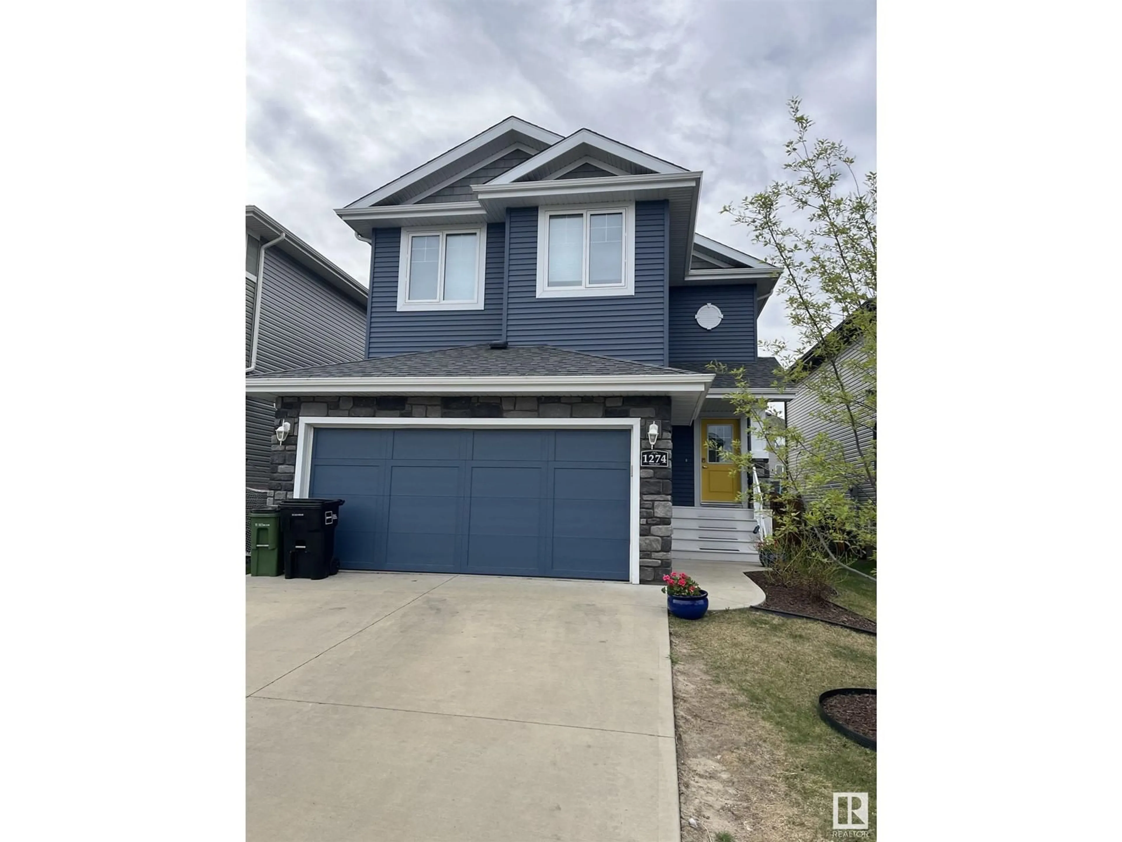 Home with vinyl exterior material, street for NW - 1274 PEREGRINE TC, Edmonton Alberta T5S0M4