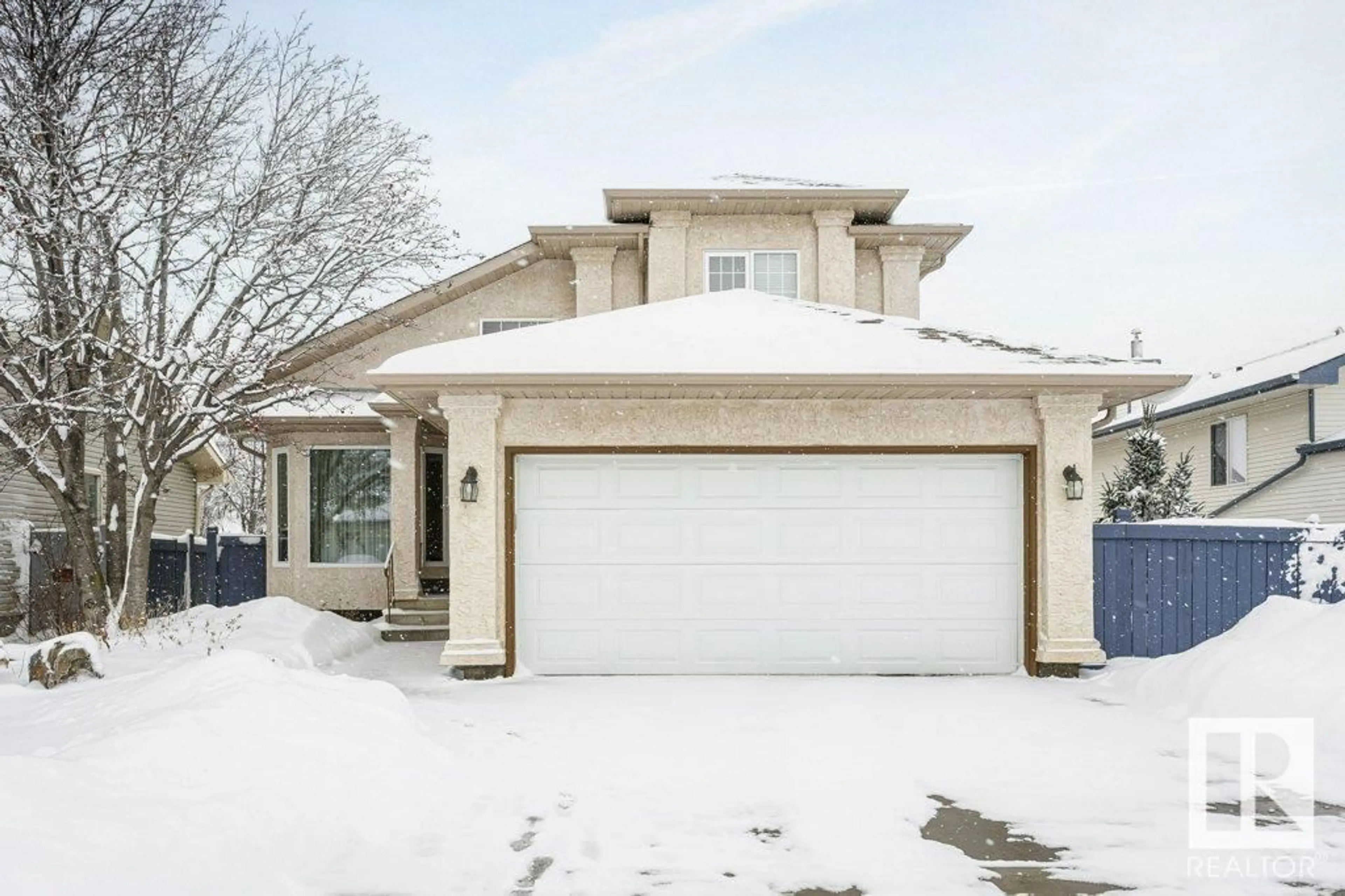 Home with vinyl exterior material, street for 10337 176A AV, Edmonton Alberta T5X5X3