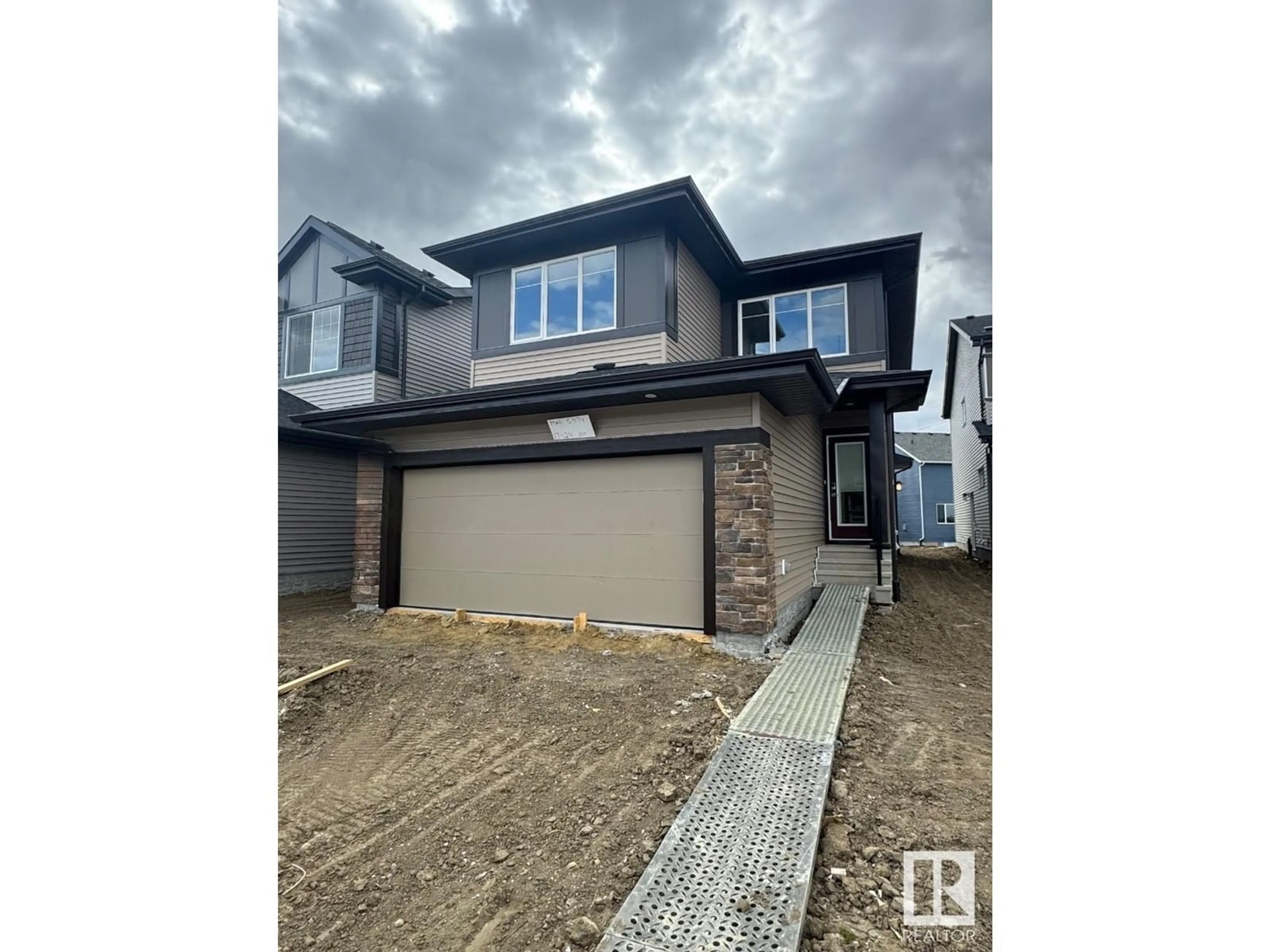 A pic from outside/outdoor area/front of a property/back of a property/a pic from drone, street for NW - 17424 2 ST, Edmonton Alberta T5Y4G6