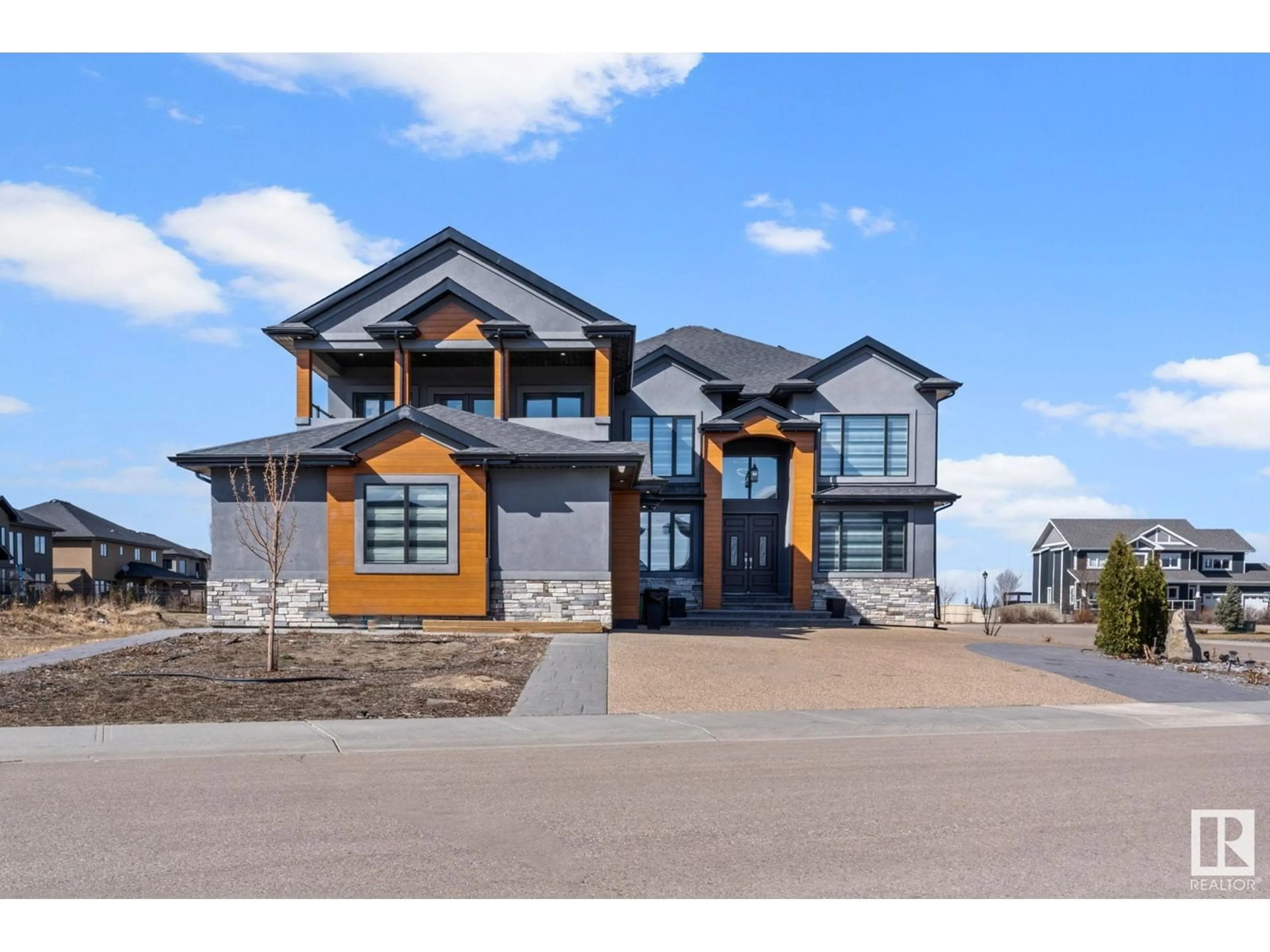 Home with brick exterior material, street for NE - 916 166 AV, Edmonton Alberta T5Y0P6