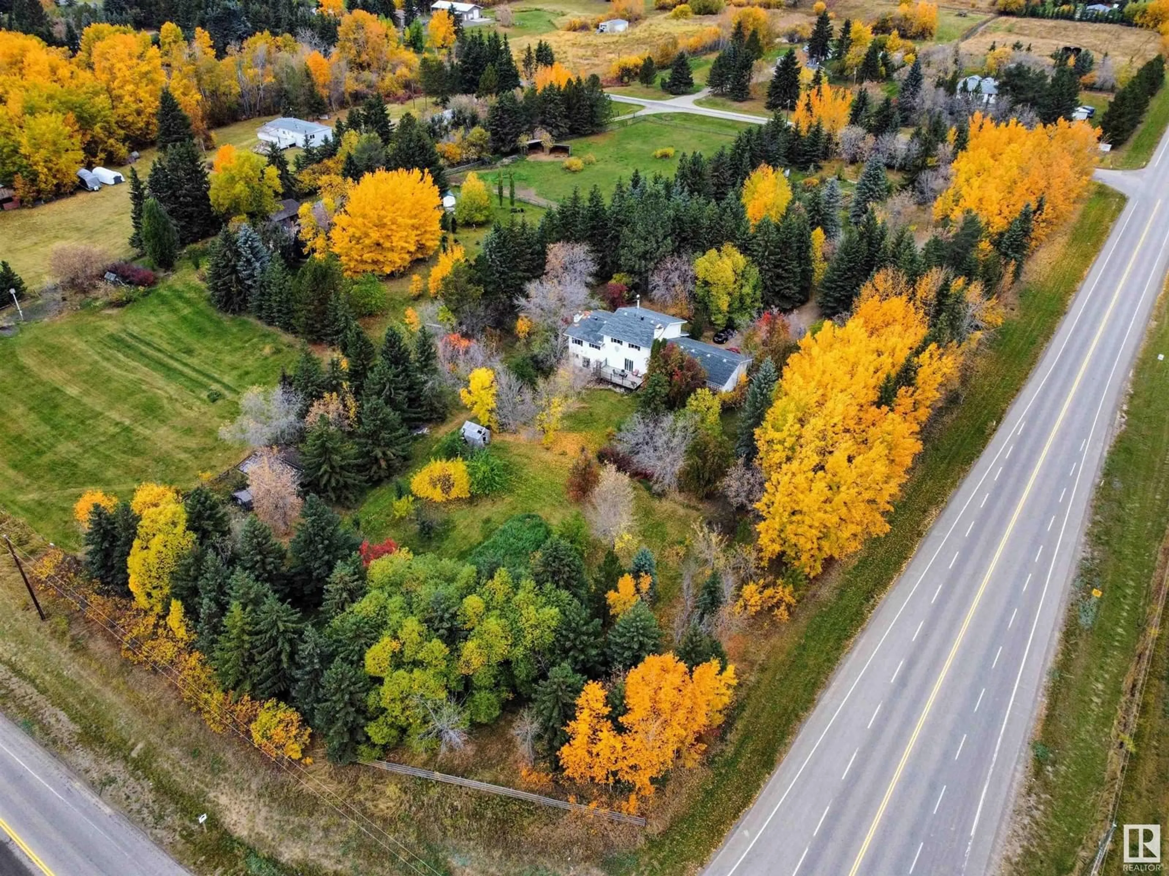 A pic from outside/outdoor area/front of a property/back of a property/a pic from drone, street for 54006 RGE ROAD 274, Rural Parkland County Alberta T7X3S8