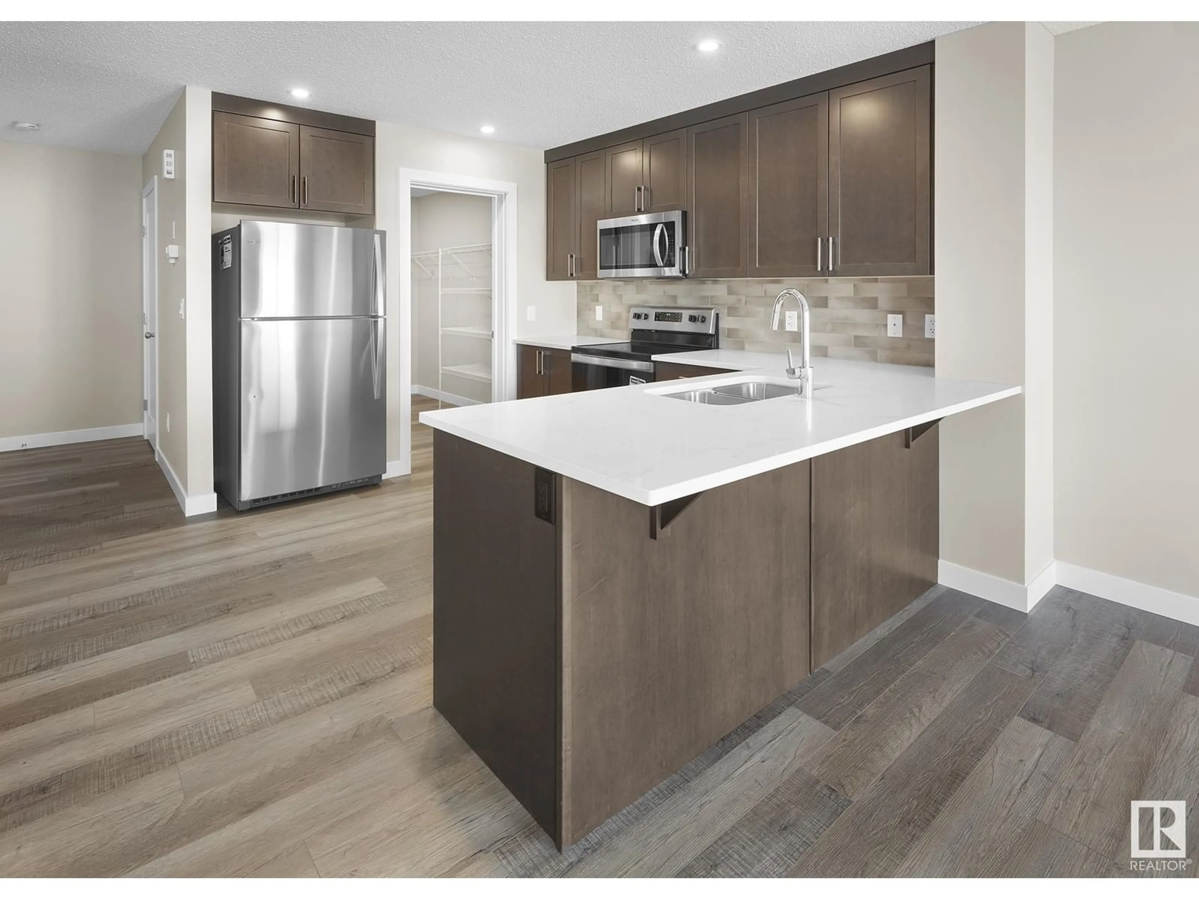 Open concept kitchen, unknown for 762 BERG LO, Leduc Alberta T9E1G8