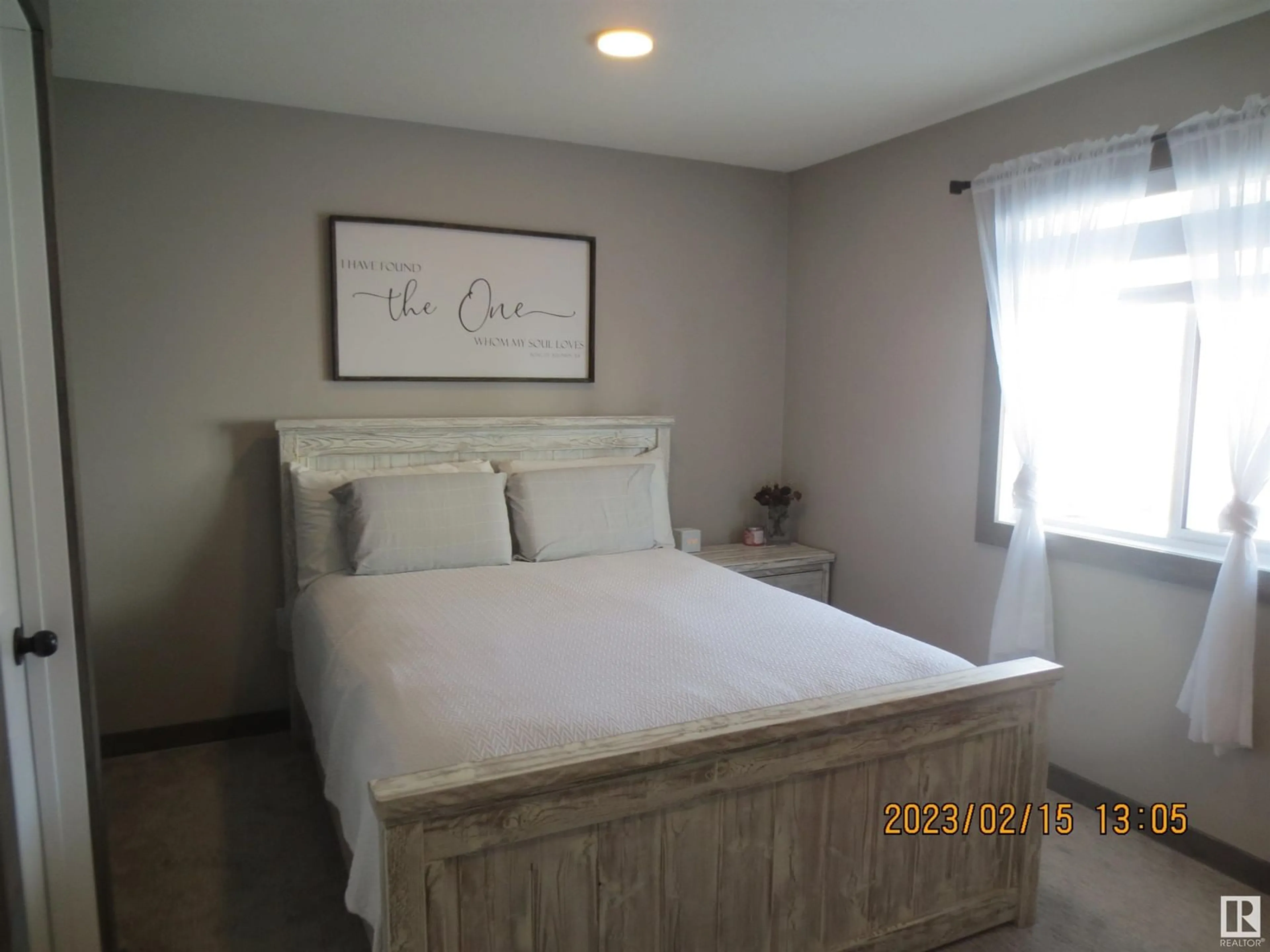 Bedroom with bed, wood/laminate floor for 4910 50 ST, Peers Alberta T0E1W0