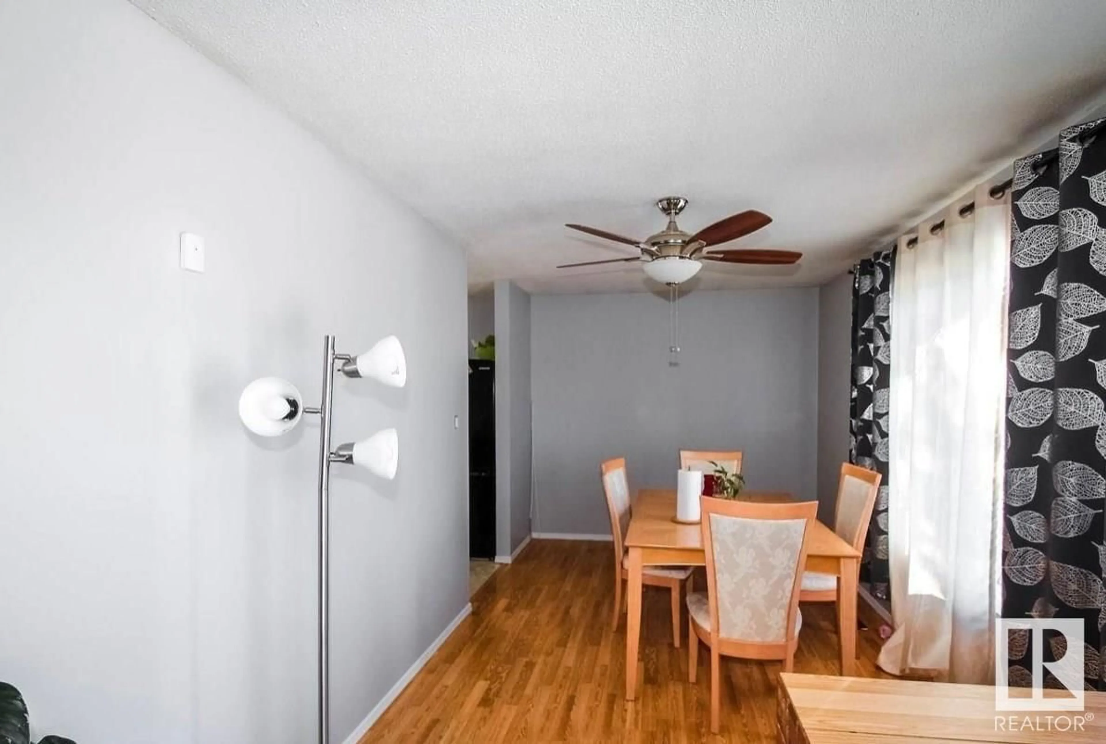 Dining room, wood/laminate floor for SW - 5134 47 AVENUE, St. Paul Town Alberta T0A3A4