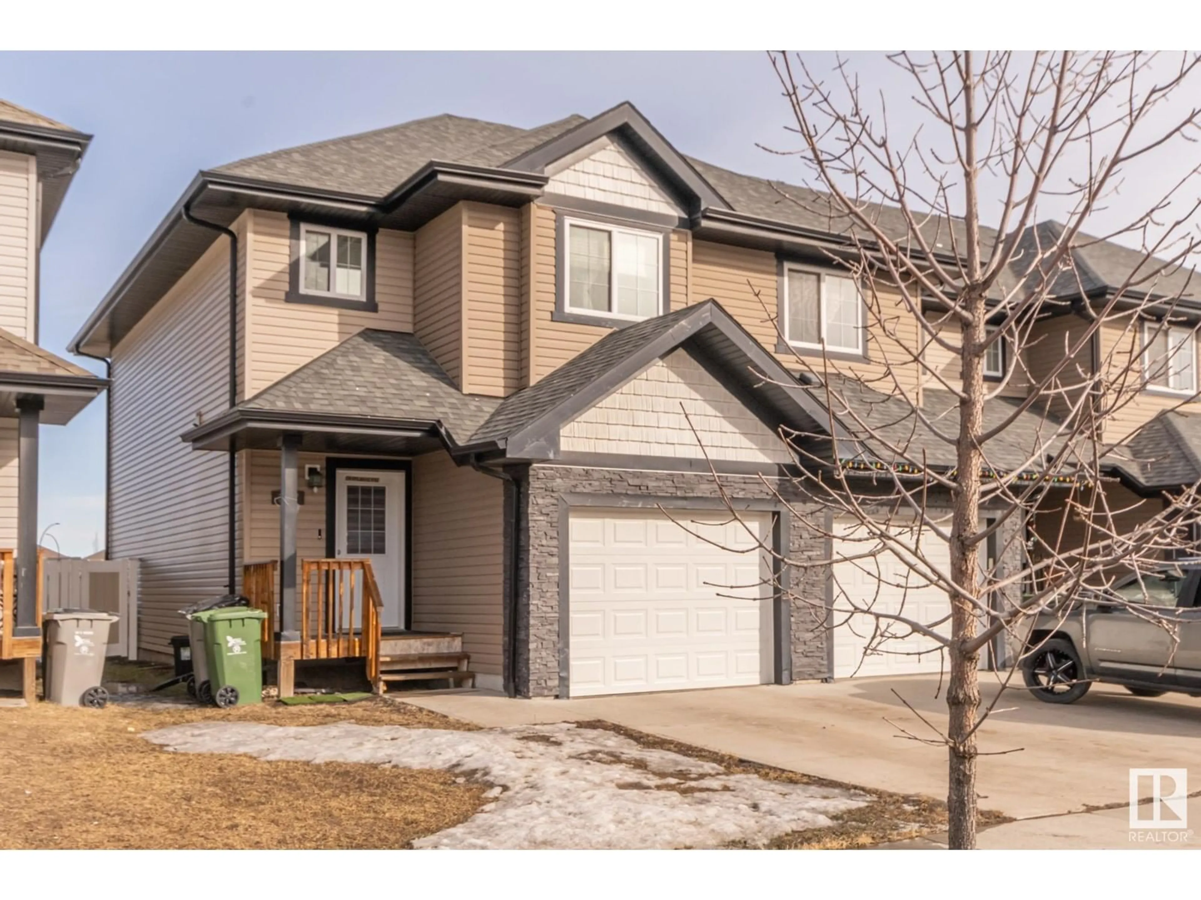 Home with vinyl exterior material, street for 3207 67 ST, Beaumont Alberta T4X0W7