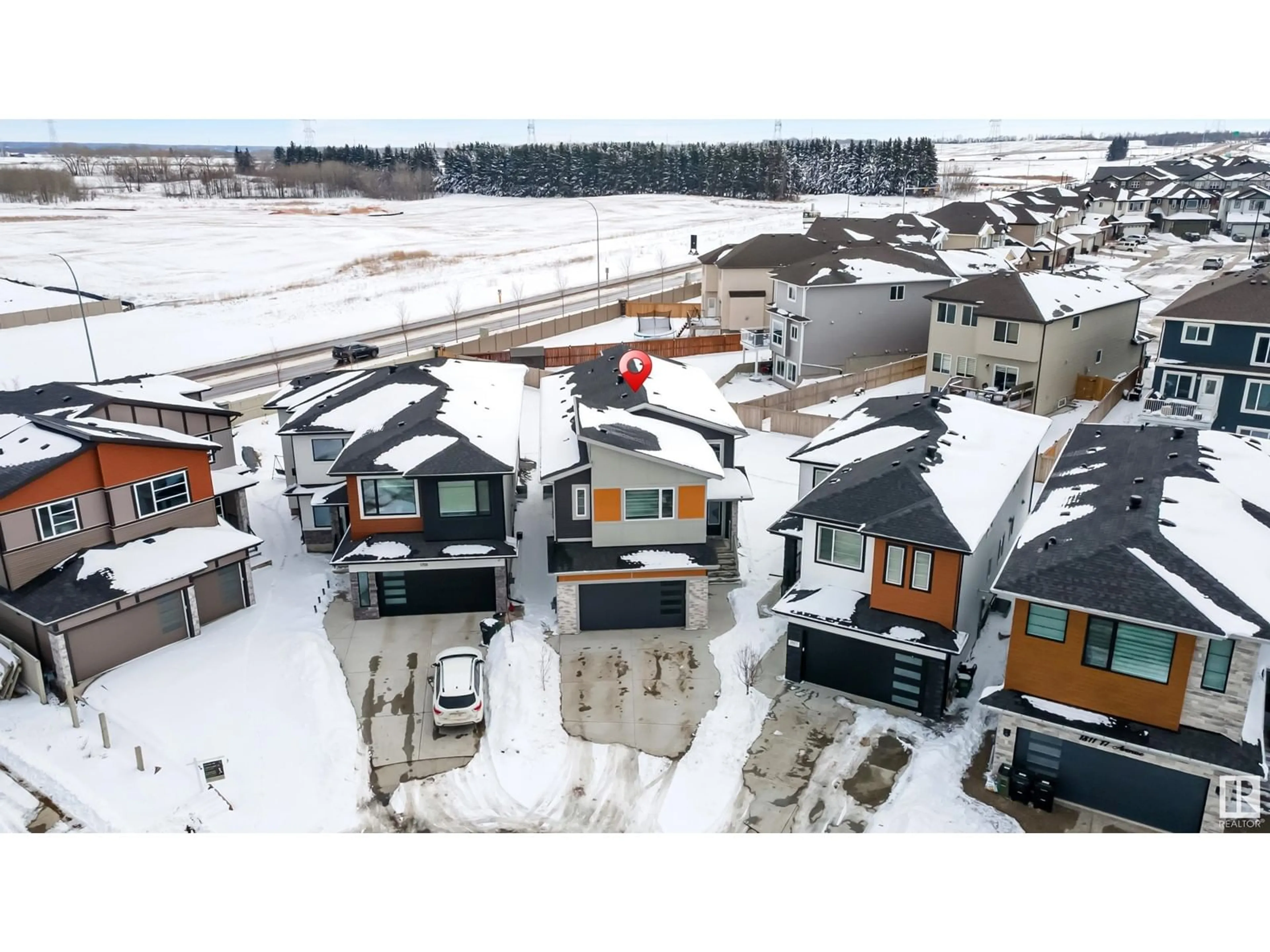 A pic from outside/outdoor area/front of a property/back of a property/a pic from drone, street for 1803 17 AV, Edmonton Alberta T6T2N2