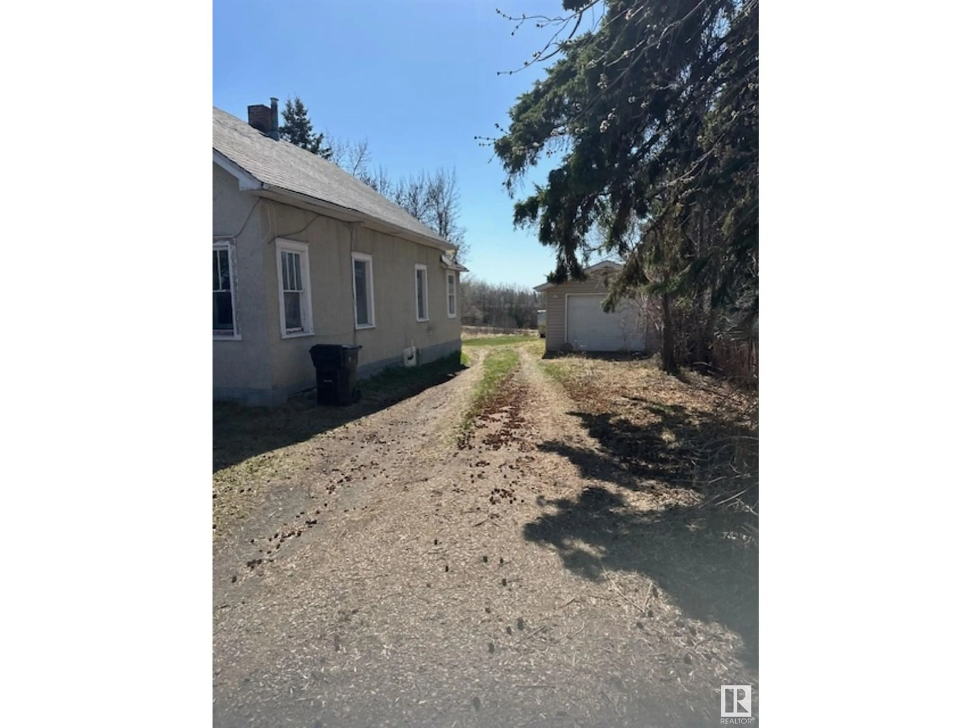 A pic from outside/outdoor area/front of a property/back of a property/a pic from drone, street for 4711 51 AV, Waskatenau Alberta T0A3P0