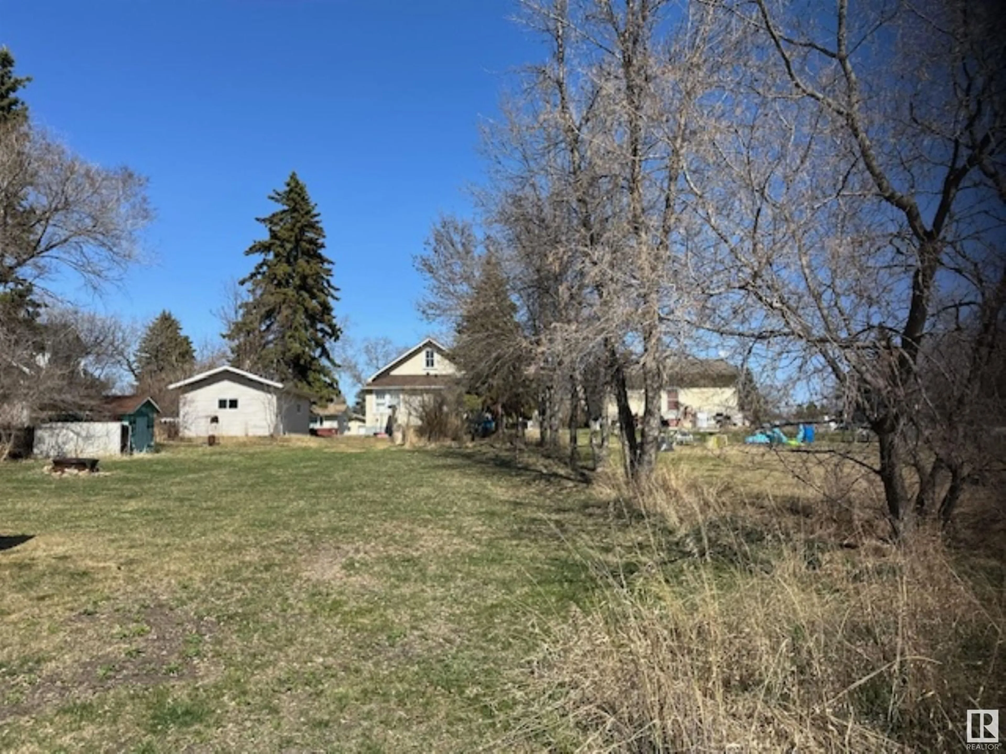 A pic from outside/outdoor area/front of a property/back of a property/a pic from drone, unknown for 4711 51 AV, Waskatenau Alberta T0A3P0