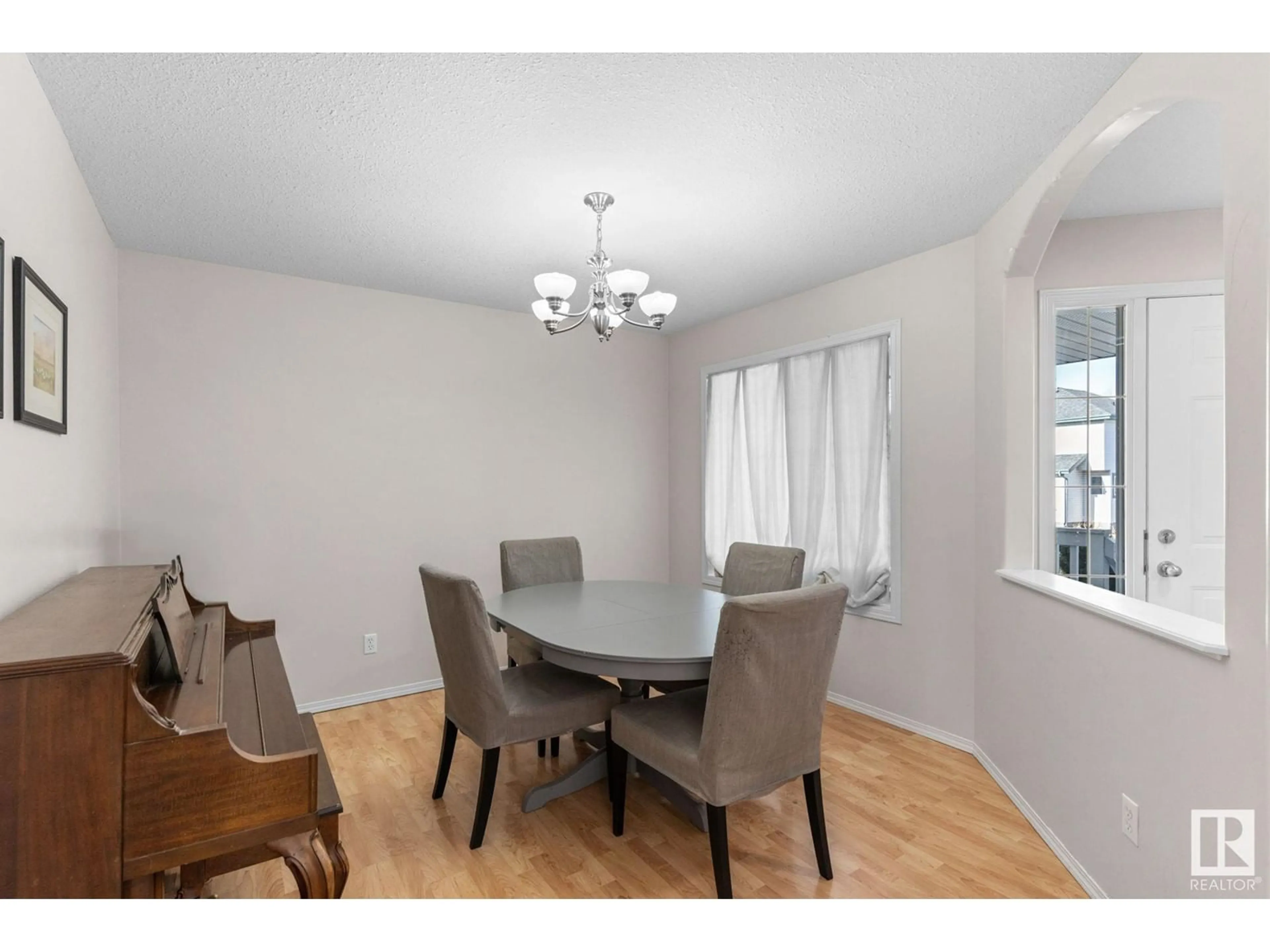 Dining room, wood/laminate floor for 523 HUNTERS GR, Edmonton Alberta T6R3B6