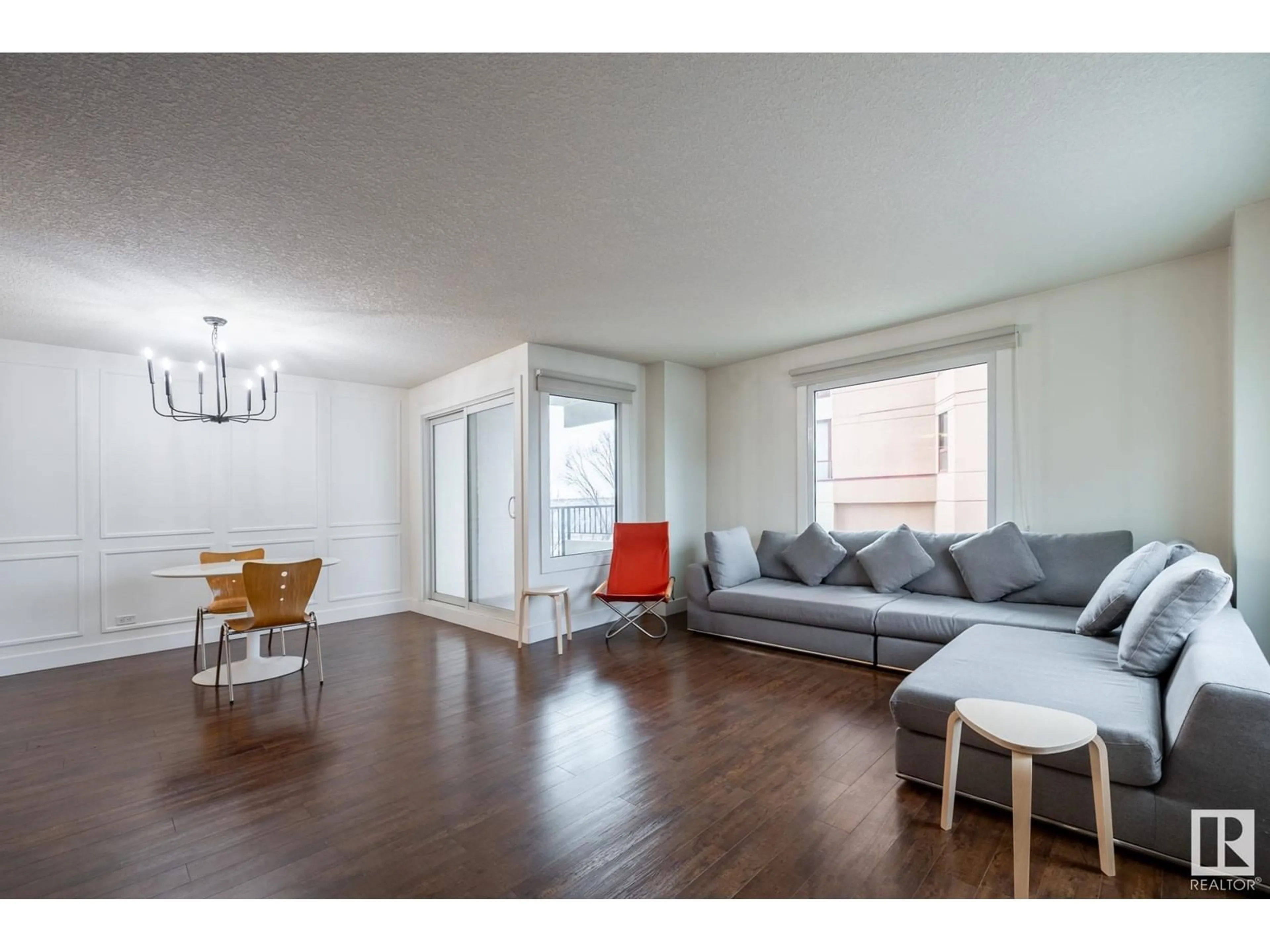 Living room with furniture, wood/laminate floor for #203 - 12303 JASPER AV, Edmonton Alberta T5N3K7