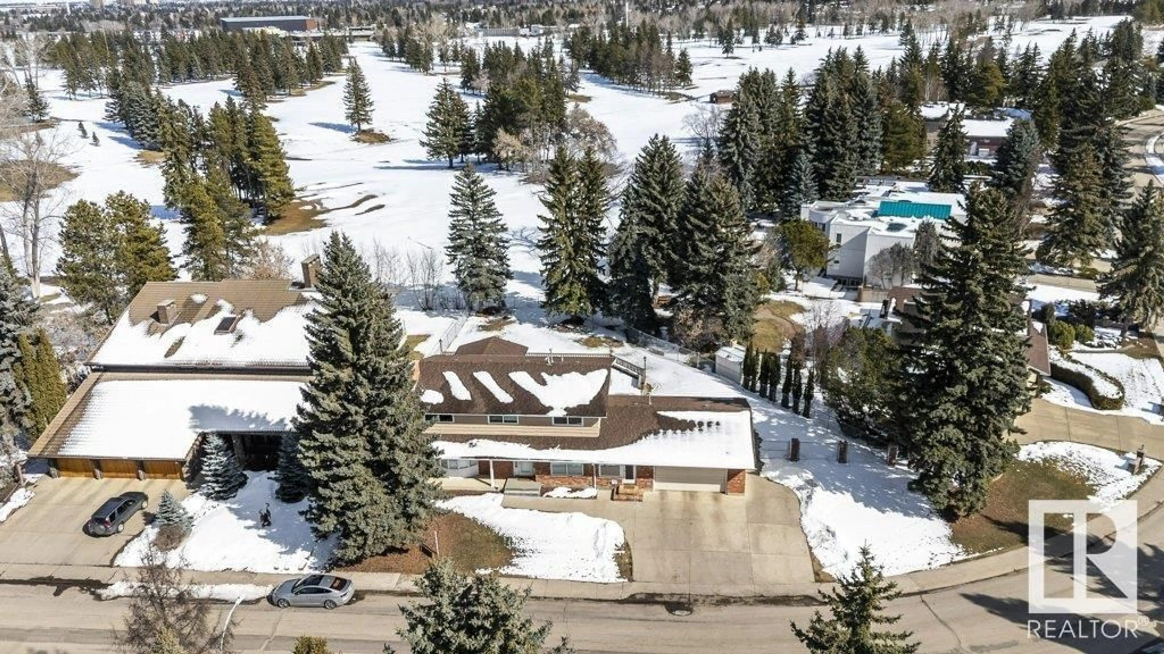 A pic from outside/outdoor area/front of a property/back of a property/a pic from drone, mountain view for 50 WESTBROOK DR, Edmonton Alberta T6J2C9