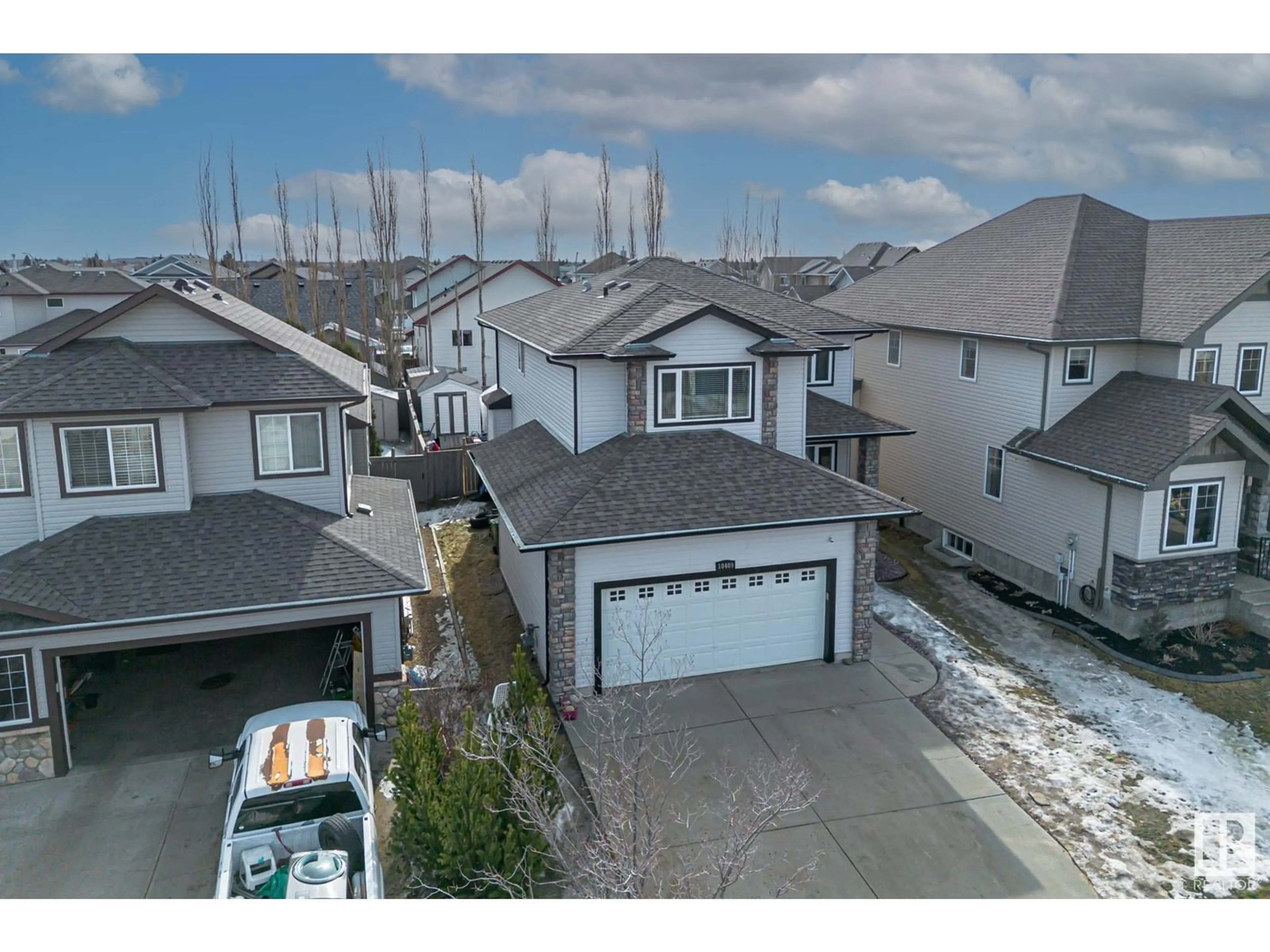 A pic from outside/outdoor area/front of a property/back of a property/a pic from drone, street for 10409 95 ST, Morinville Alberta T8R0B2