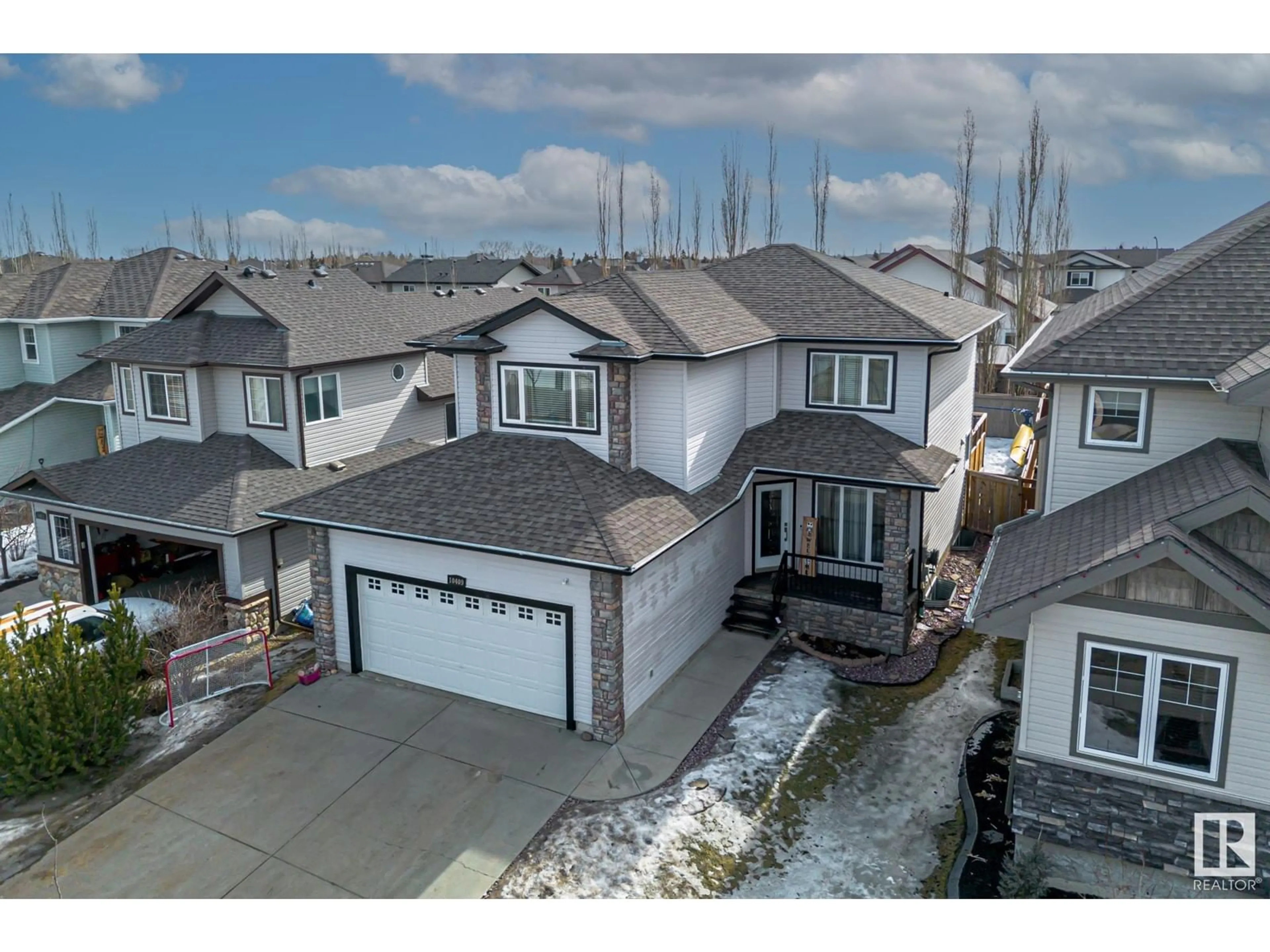 A pic from outside/outdoor area/front of a property/back of a property/a pic from drone, street for 10409 95 ST, Morinville Alberta T8R0B2