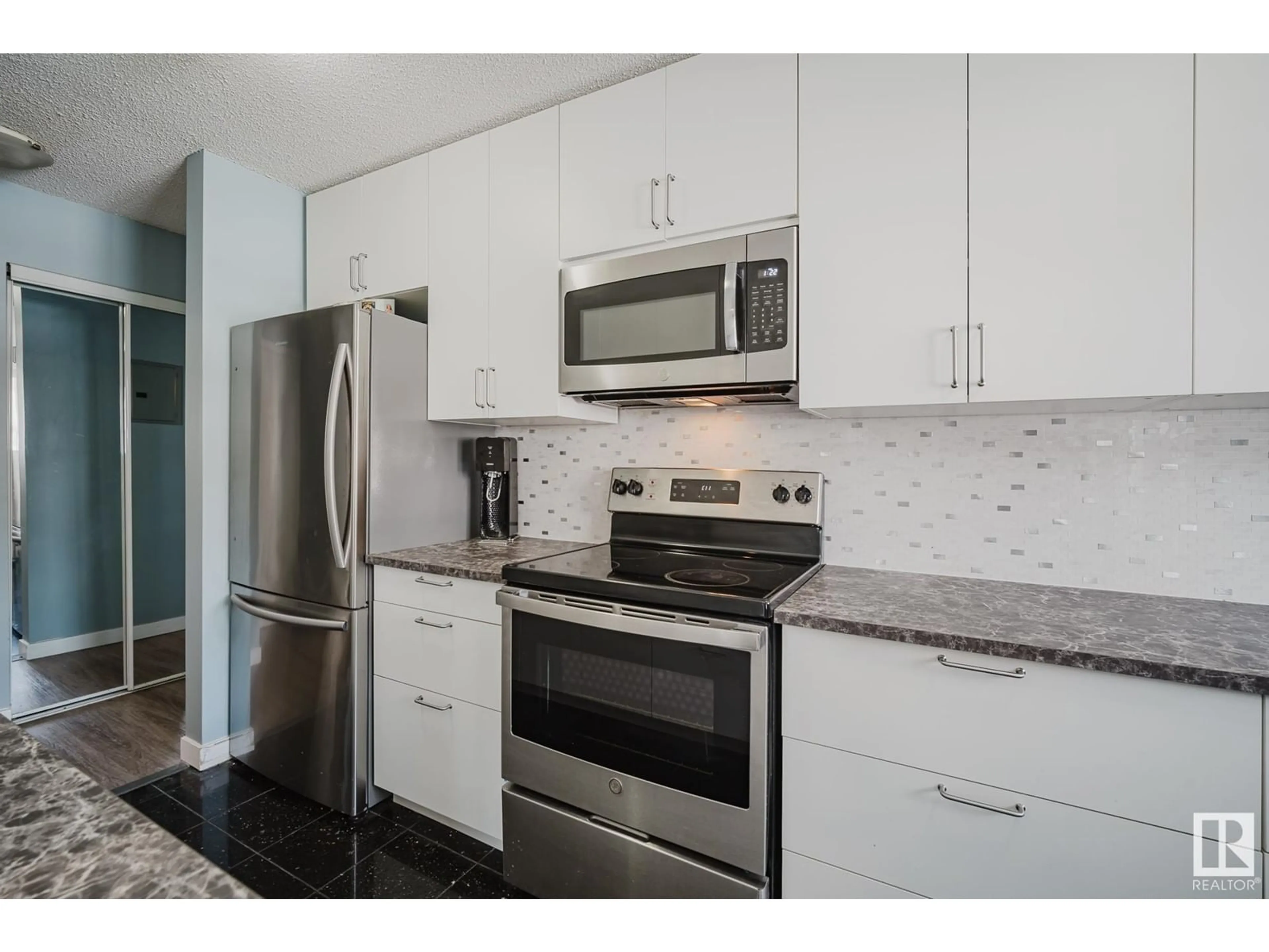 Living room with furniture, wood/laminate floor for #207 - 10149 83 AV, Edmonton Alberta T6E2C5