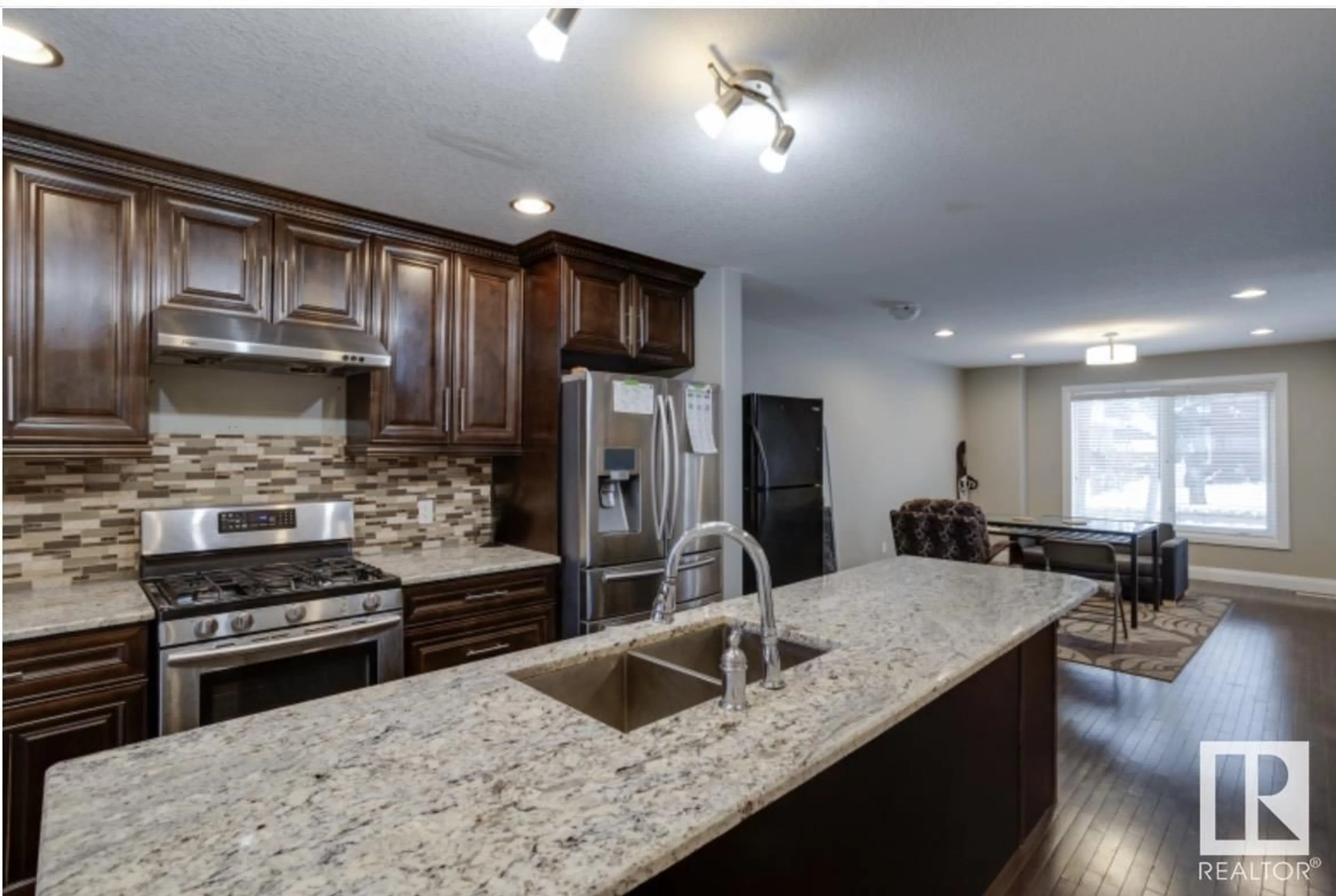 Open concept kitchen, ceramic/tile floor for 10935 76 AV, Edmonton Alberta T6G0J6