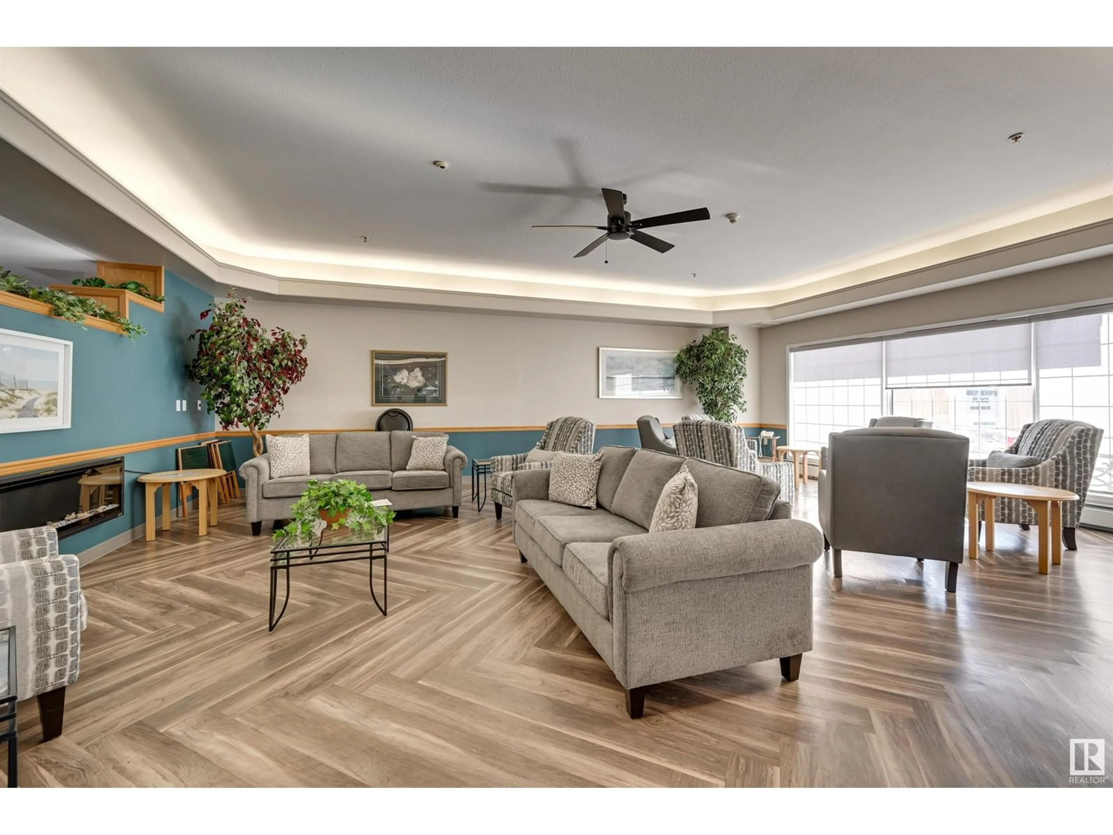 Living room with furniture, wood/laminate floor for 244 13441 127 ST NW, Edmonton Alberta T5L5B6