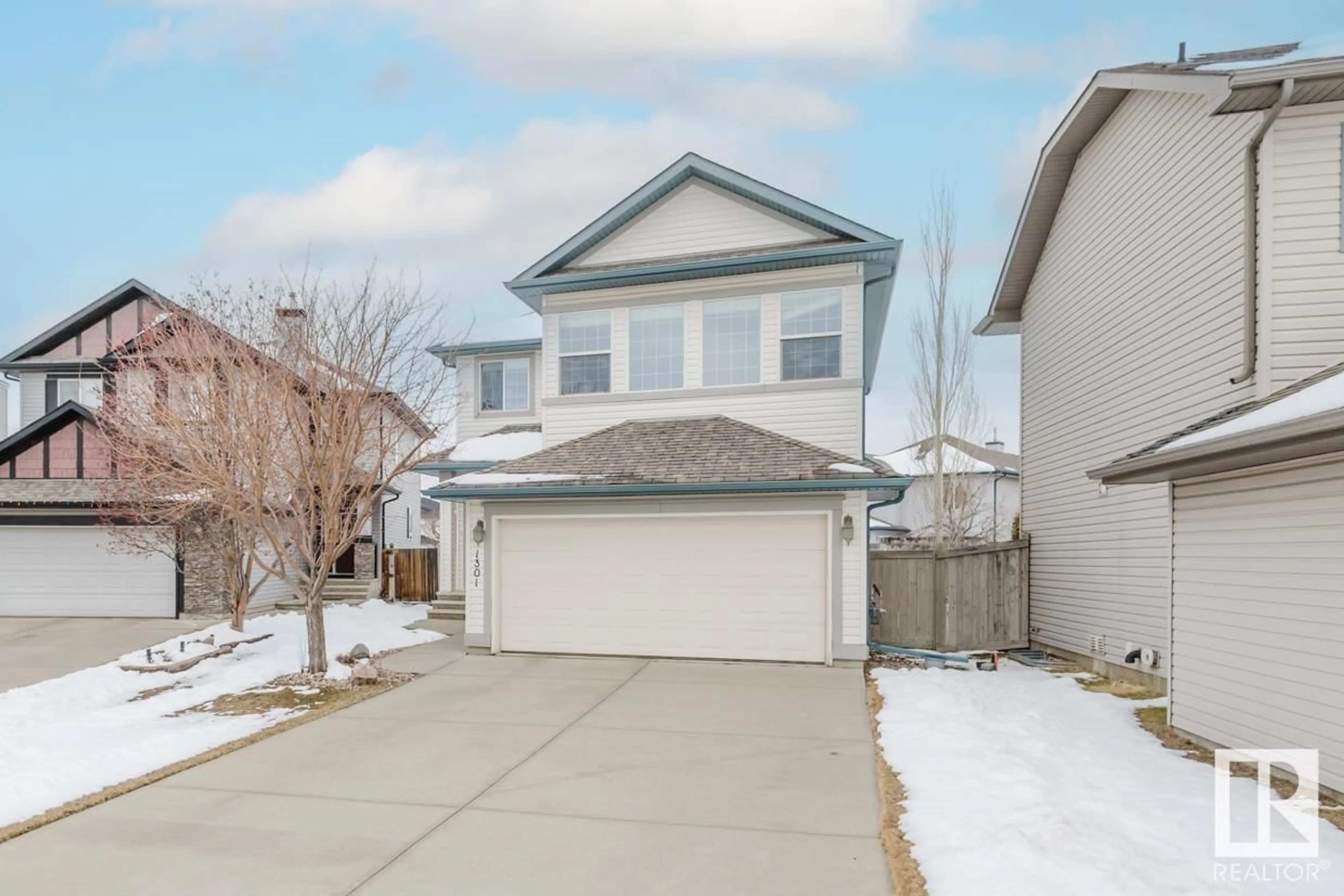 Home with vinyl exterior material, street for 1301 MCALLISTER WY, Edmonton Alberta T6W0B1