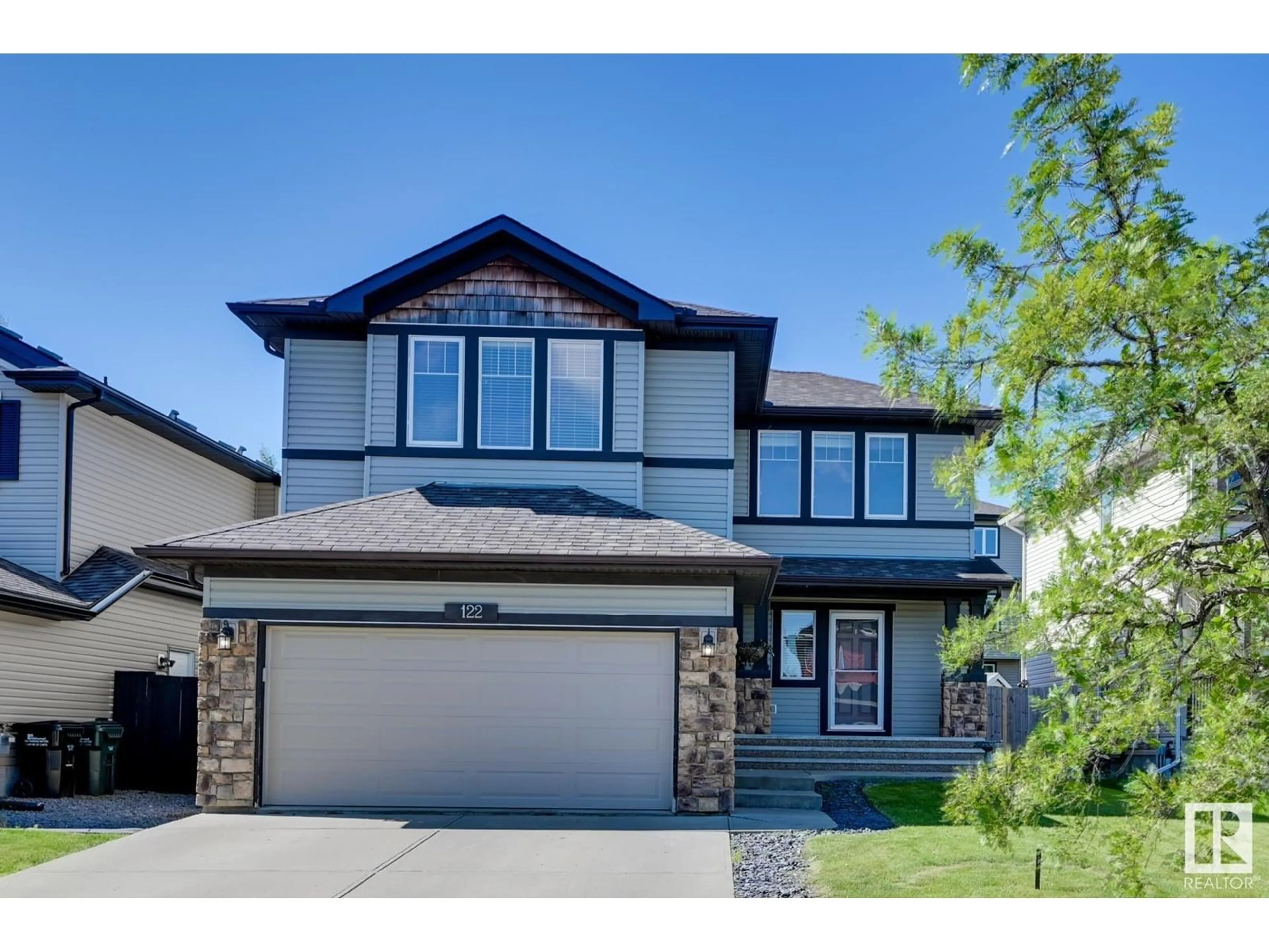 Home with vinyl exterior material, street for 122 CAMPBELL DR, Sherwood Park Alberta T8H0E3
