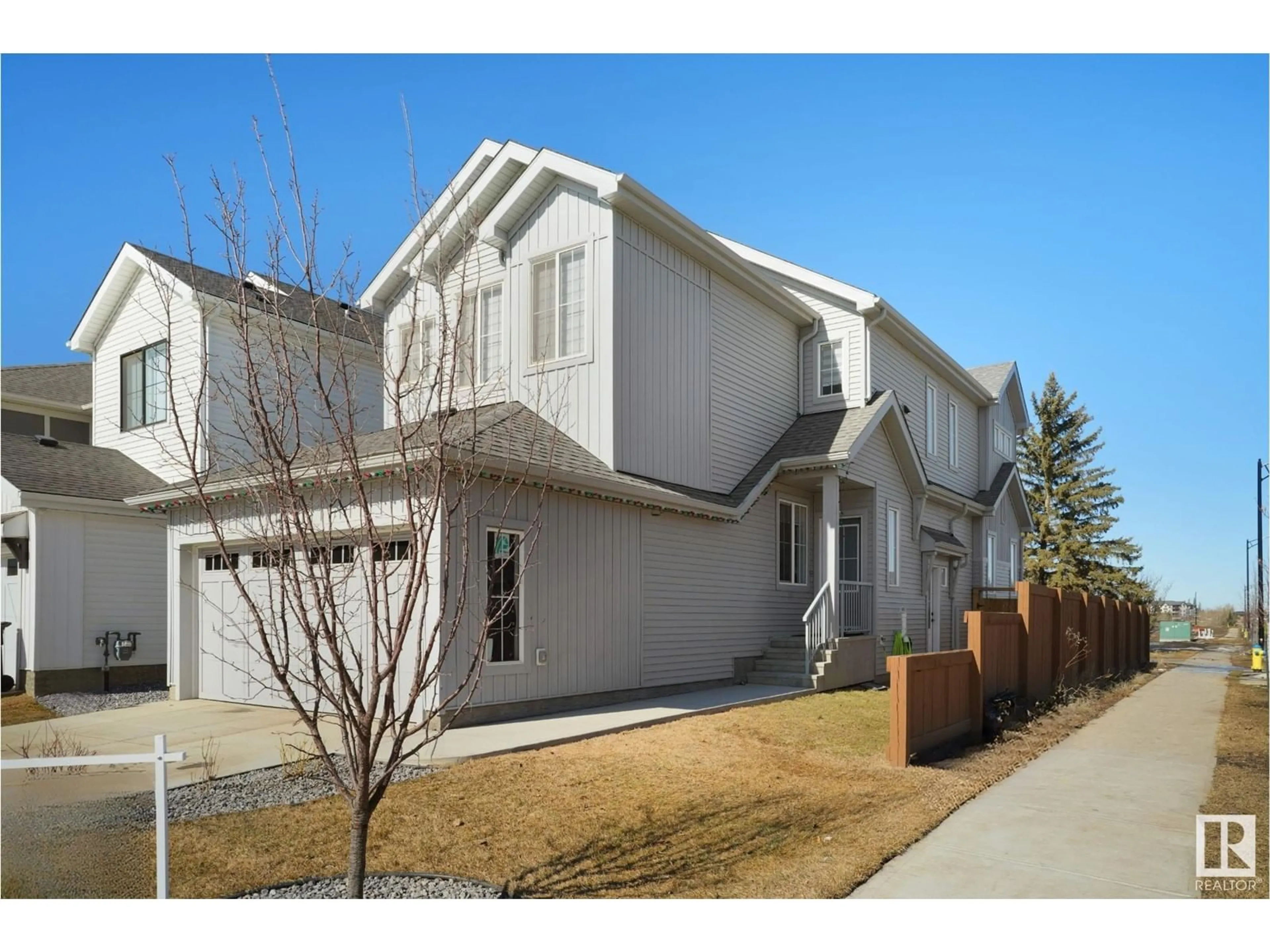 Home with vinyl exterior material, street for SW SW - 1804 COLLIP VW, Edmonton Alberta T6W1A8