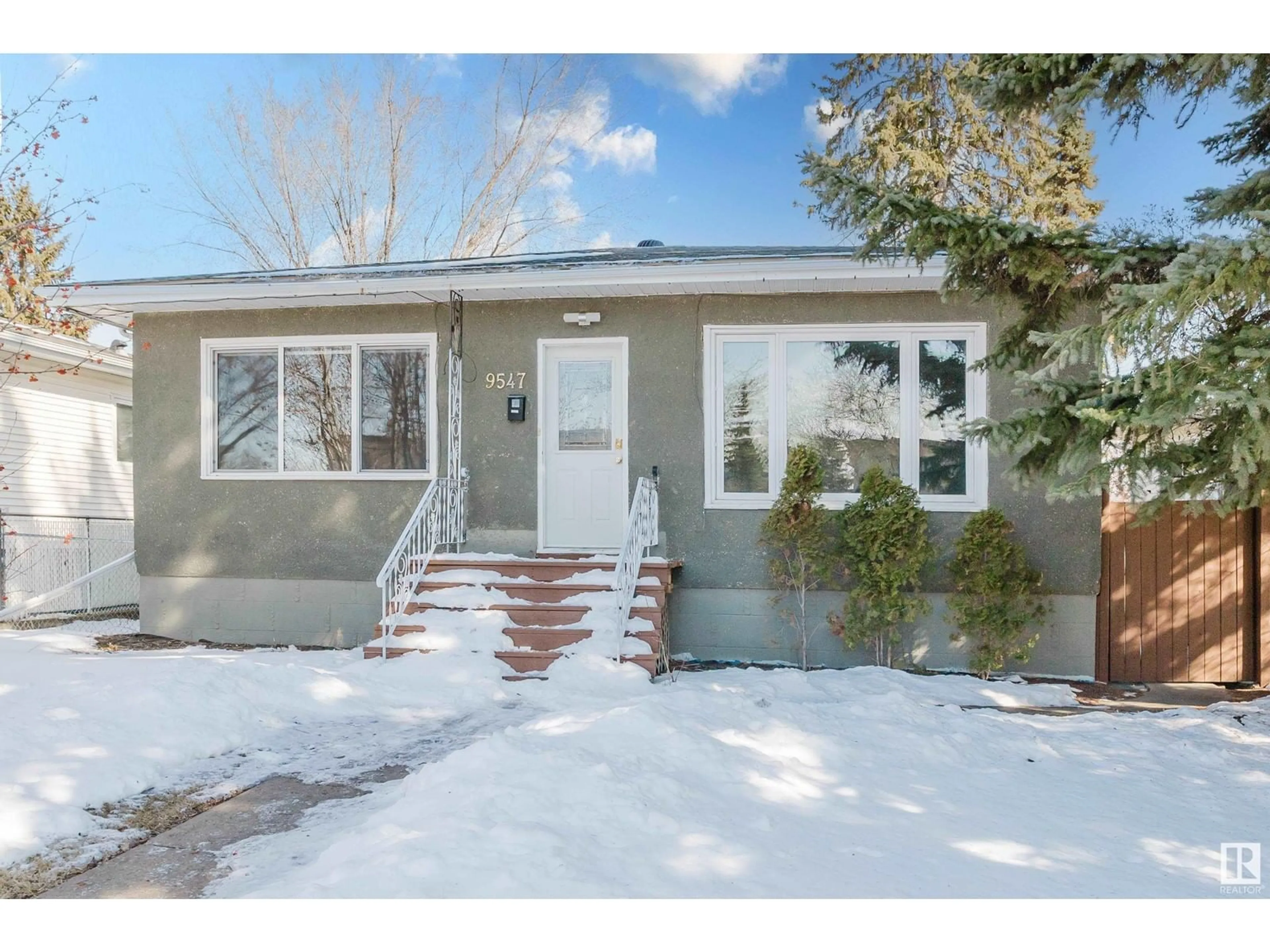 Home with vinyl exterior material, street for NW - 9547 87 ST, Edmonton Alberta T6C3H9