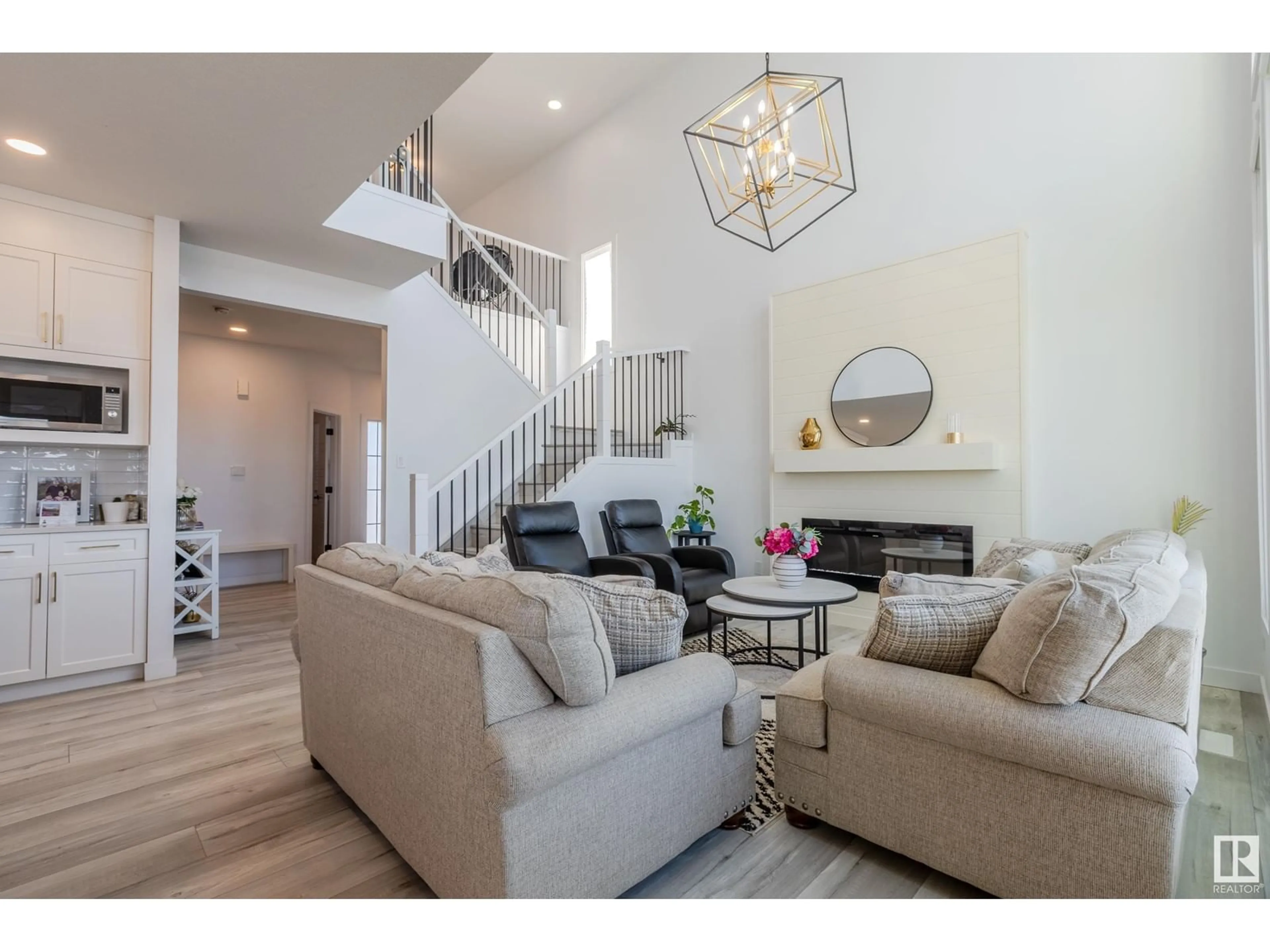 Living room with furniture, unknown for 10511 106 AV, Morinville Alberta T8R0C9