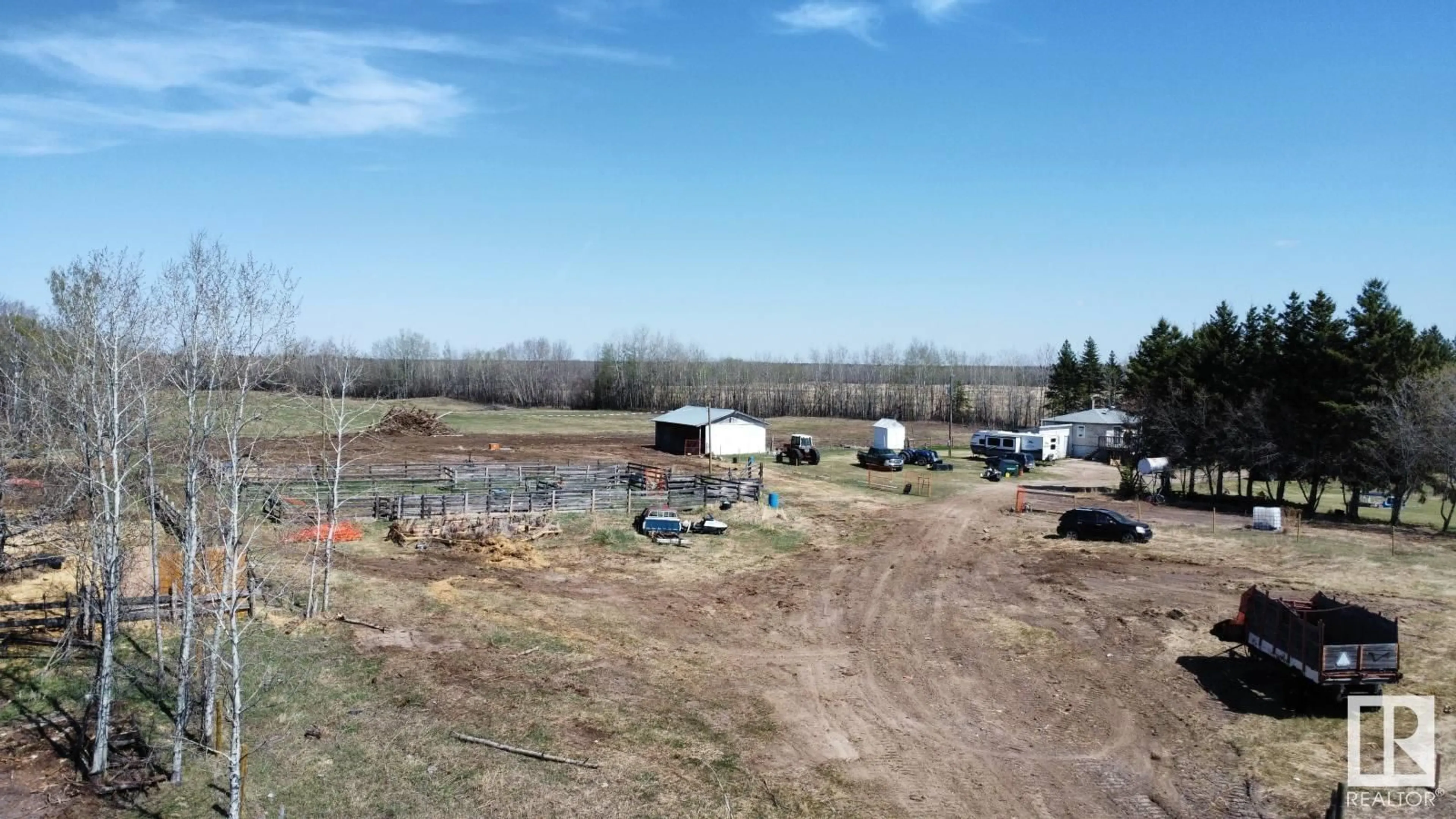 A pic from outside/outdoor area/front of a property/back of a property/a pic from drone, unknown for 62424 RR 255, Rural Westlock County Alberta T0G0S0