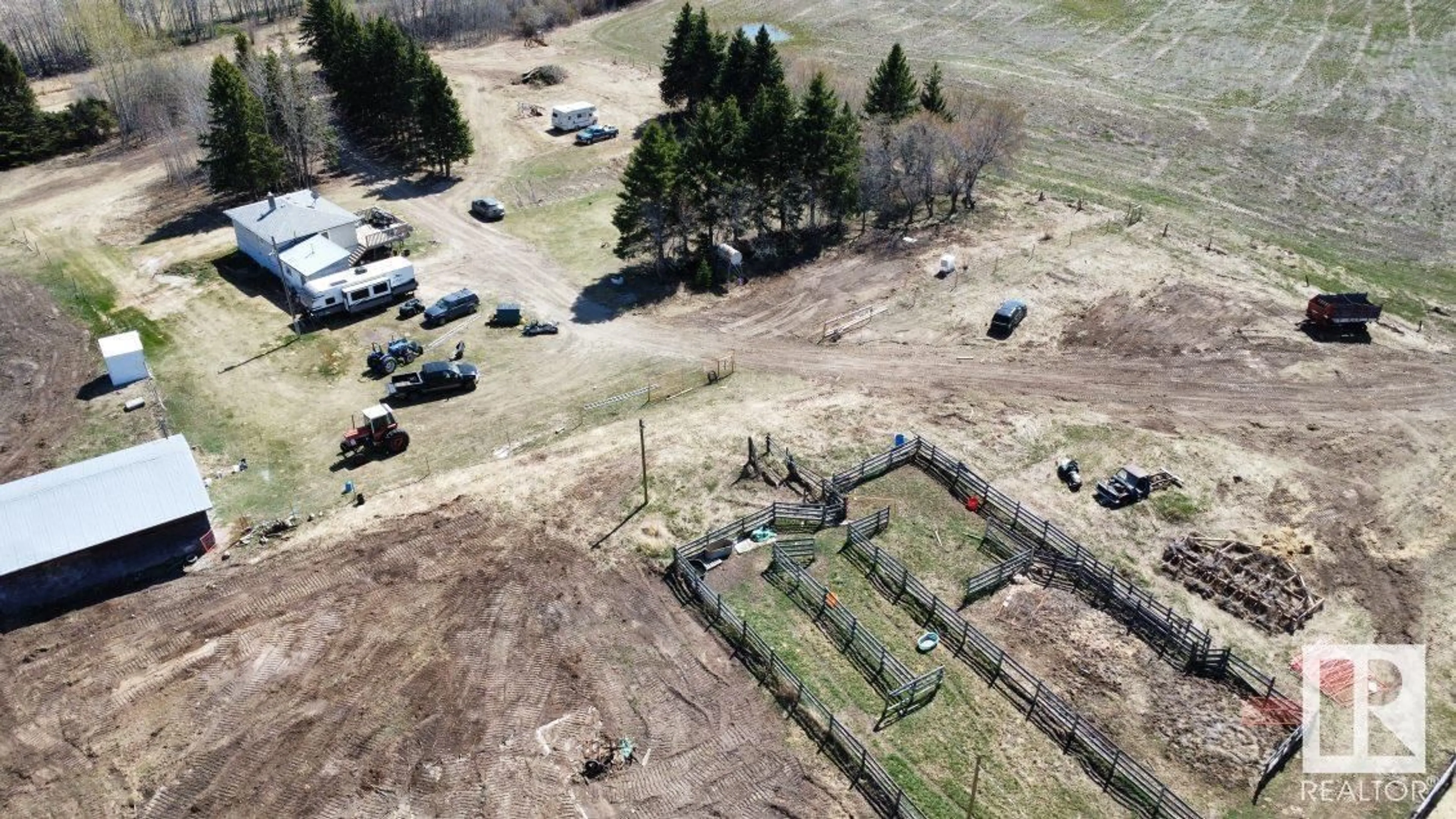 A pic from outside/outdoor area/front of a property/back of a property/a pic from drone, building for 62424 RR 255, Rural Westlock County Alberta T0G0S0