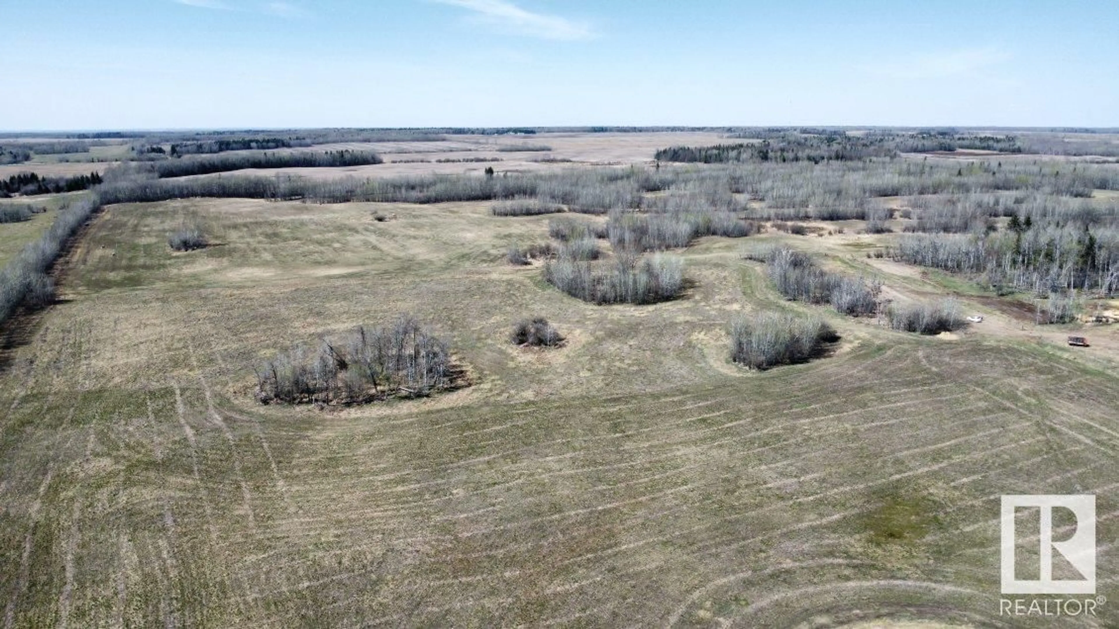 A pic from outside/outdoor area/front of a property/back of a property/a pic from drone, unknown for 62424 RR 255, Rural Westlock County Alberta T0G0S0