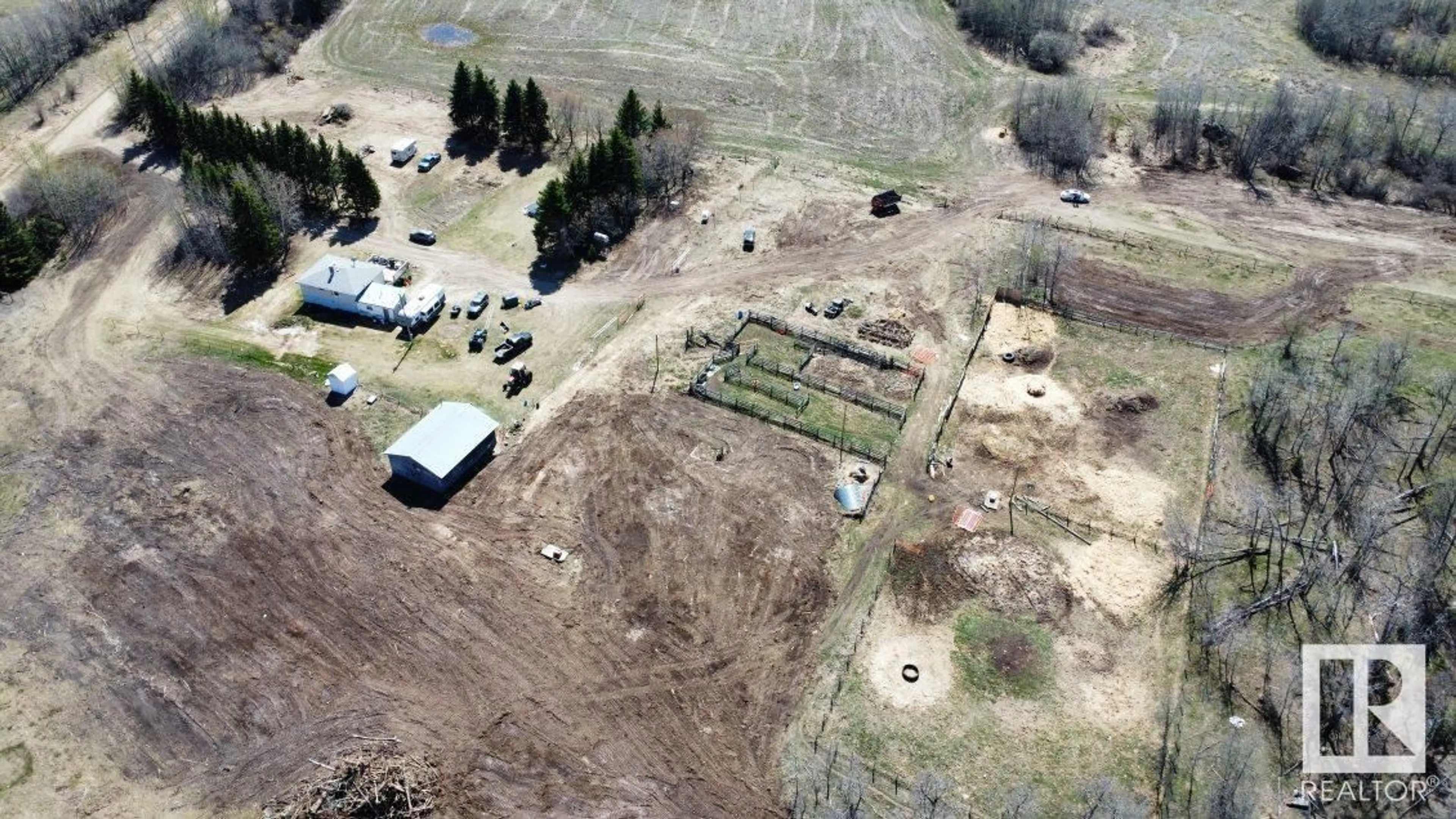 A pic from outside/outdoor area/front of a property/back of a property/a pic from drone, building for 62424 RR 255, Rural Westlock County Alberta T0G0S0