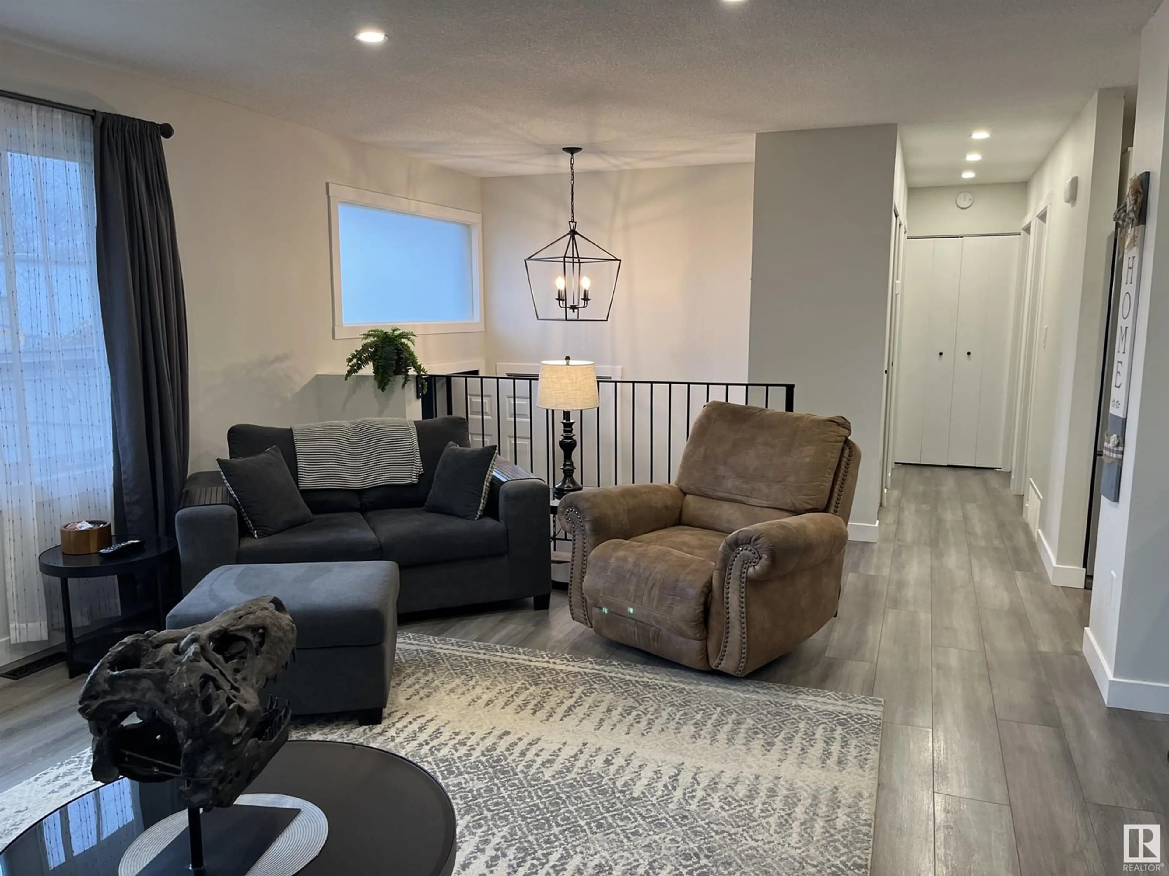 Living room with furniture, unknown for 55502 NIKOODI RD, Rural Lac Ste. Anne County Alberta T0E0X0