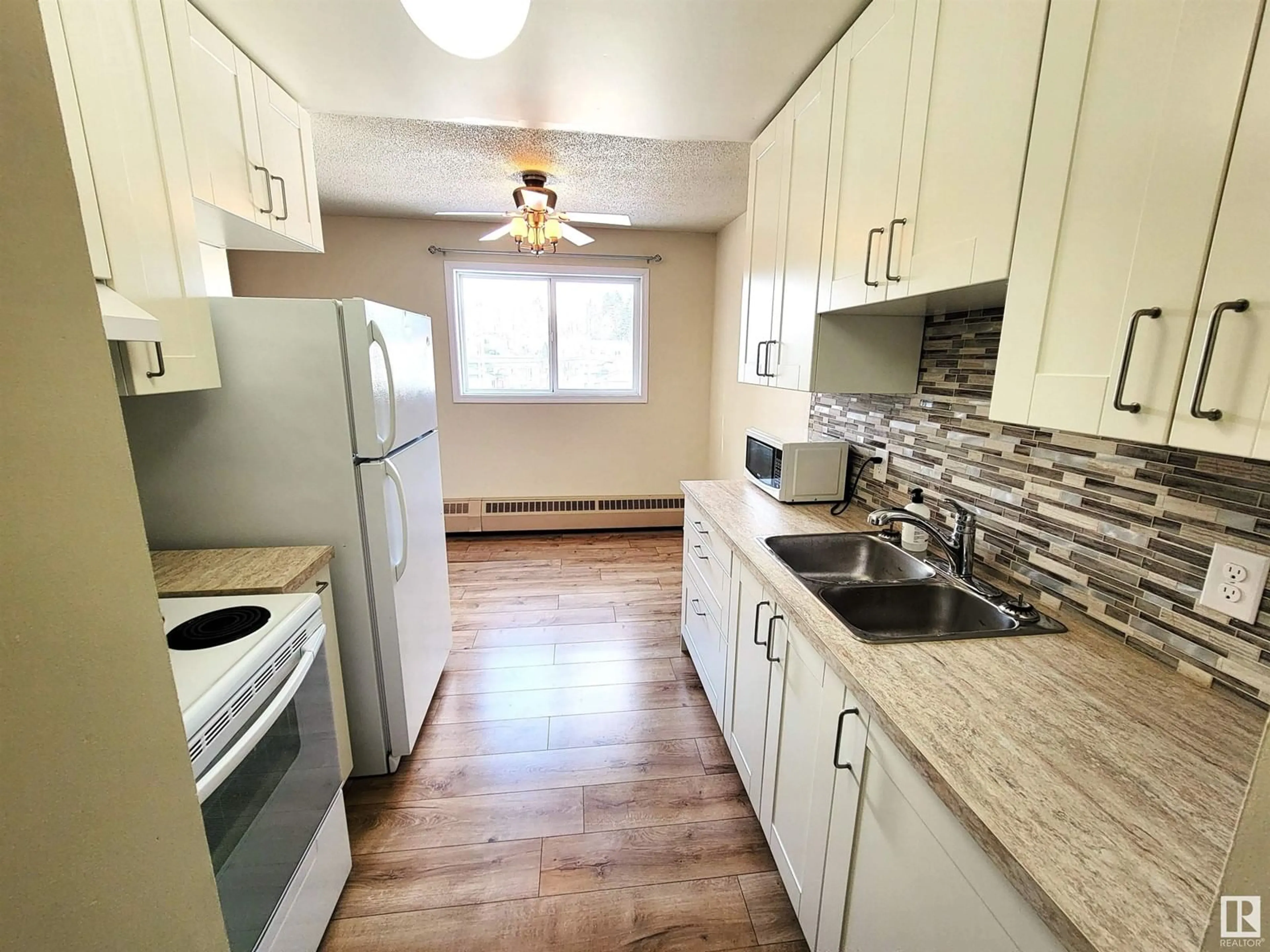 Standard kitchen, wood/laminate floor for 201 - 911 10 ST, Cold Lake Alberta T9M1J8