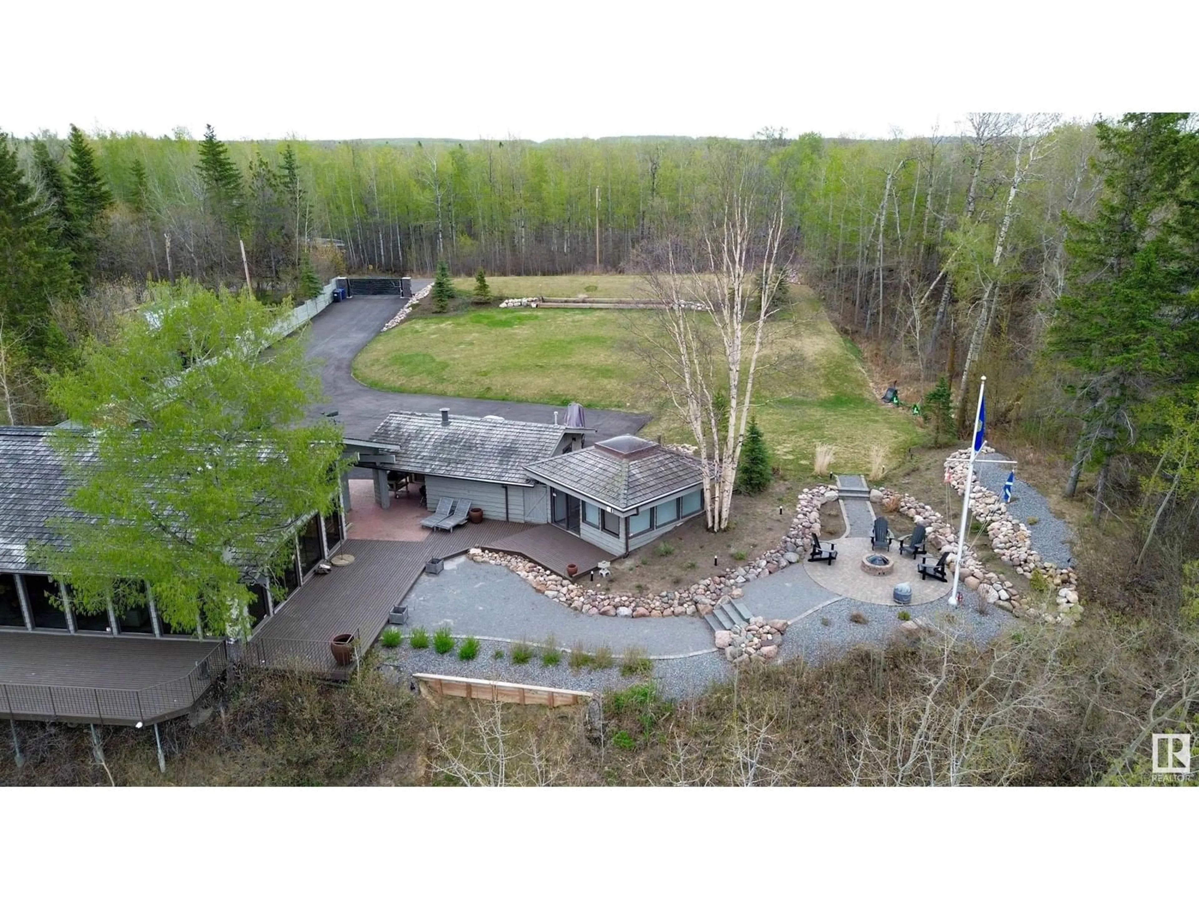 A pic from outside/outdoor area/front of a property/back of a property/a pic from drone, unknown for 139 SILVER BEACH RD, Rural Wetaskiwin County Alberta T0C2C0