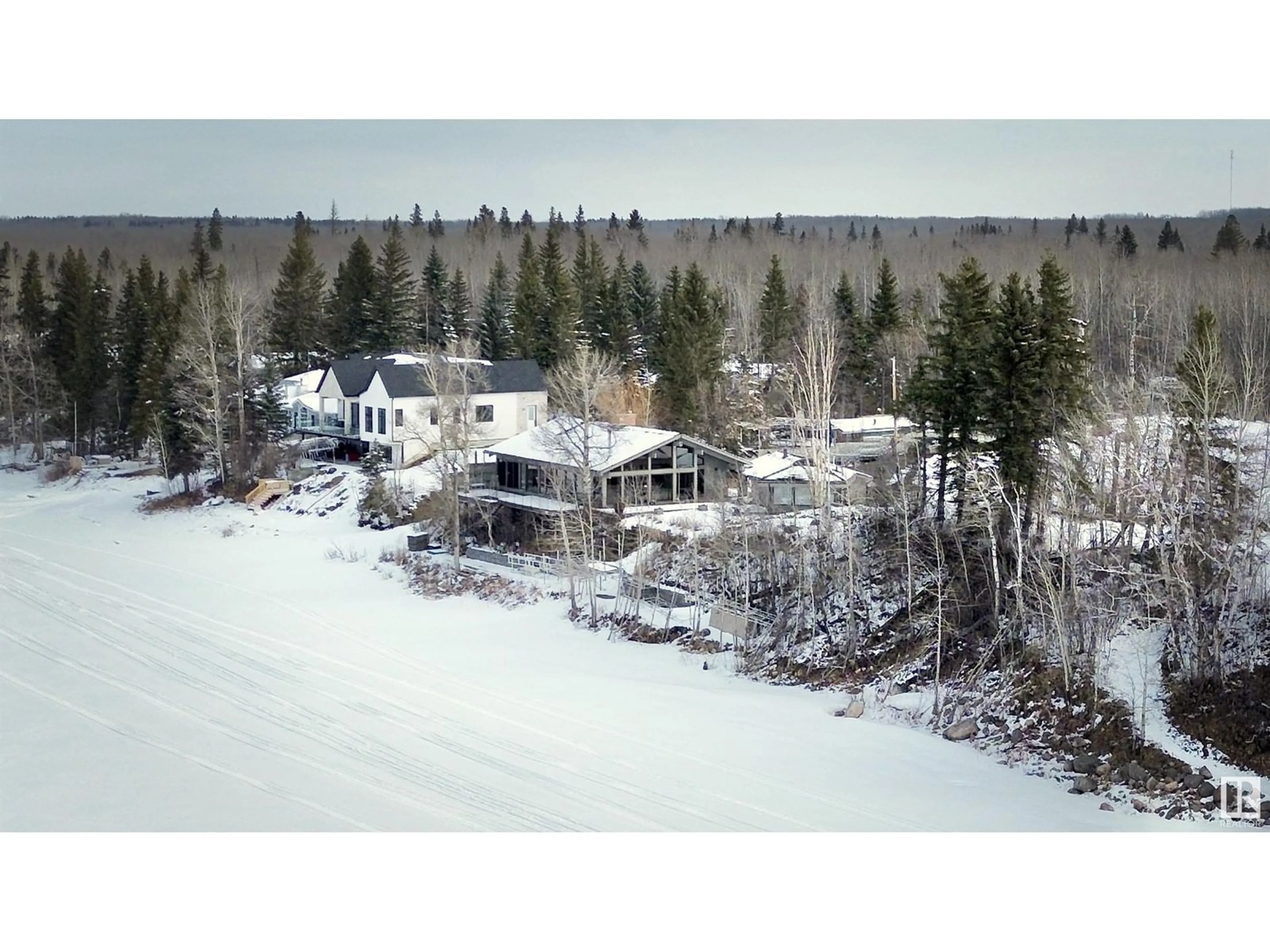 A pic from outside/outdoor area/front of a property/back of a property/a pic from drone, mountain view for 139 SILVER BEACH RD, Rural Wetaskiwin County Alberta T0C2C0