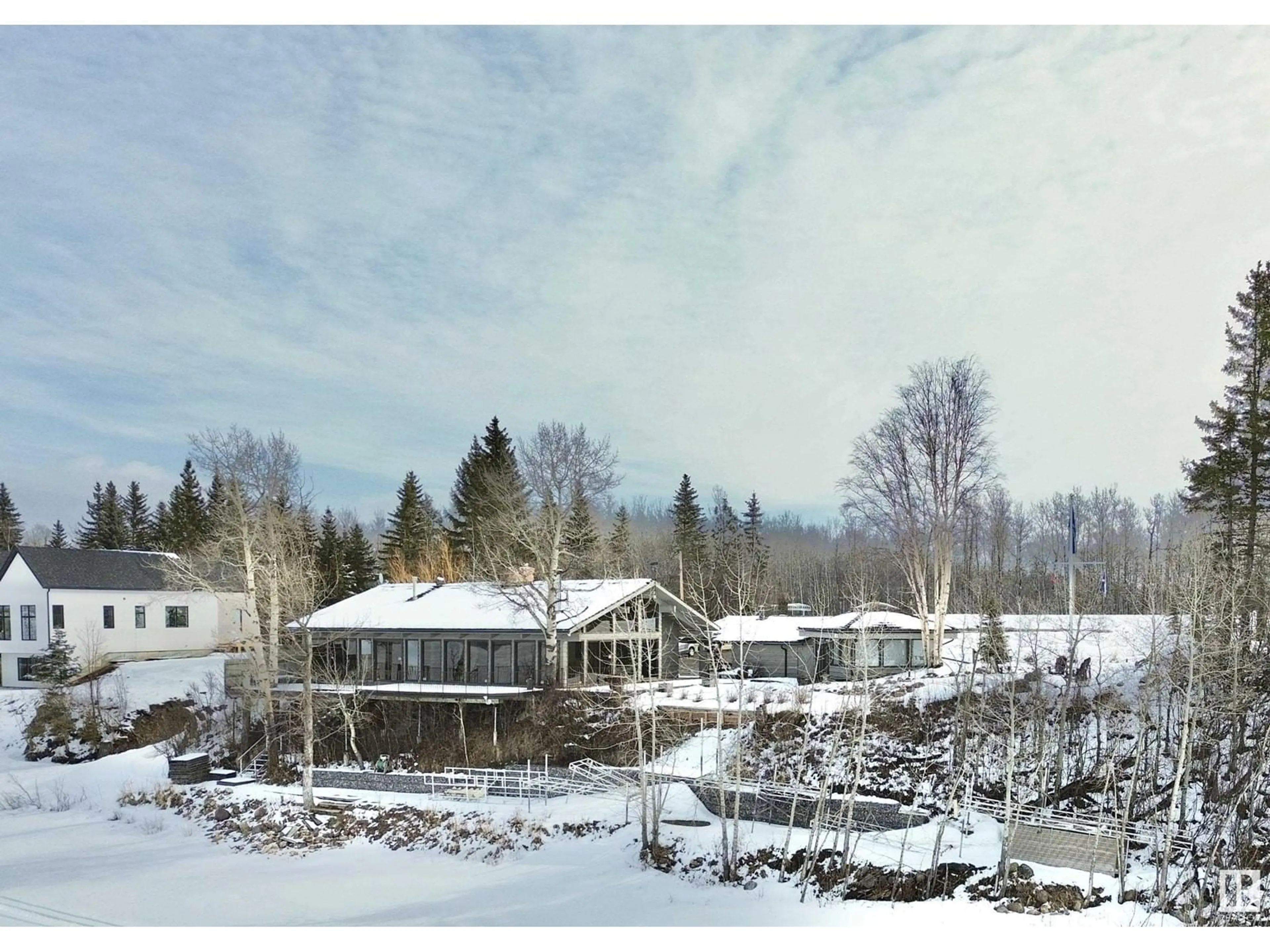 A pic from outside/outdoor area/front of a property/back of a property/a pic from drone, mountain view for 139 SILVER BEACH RD, Rural Wetaskiwin County Alberta T0C2C0