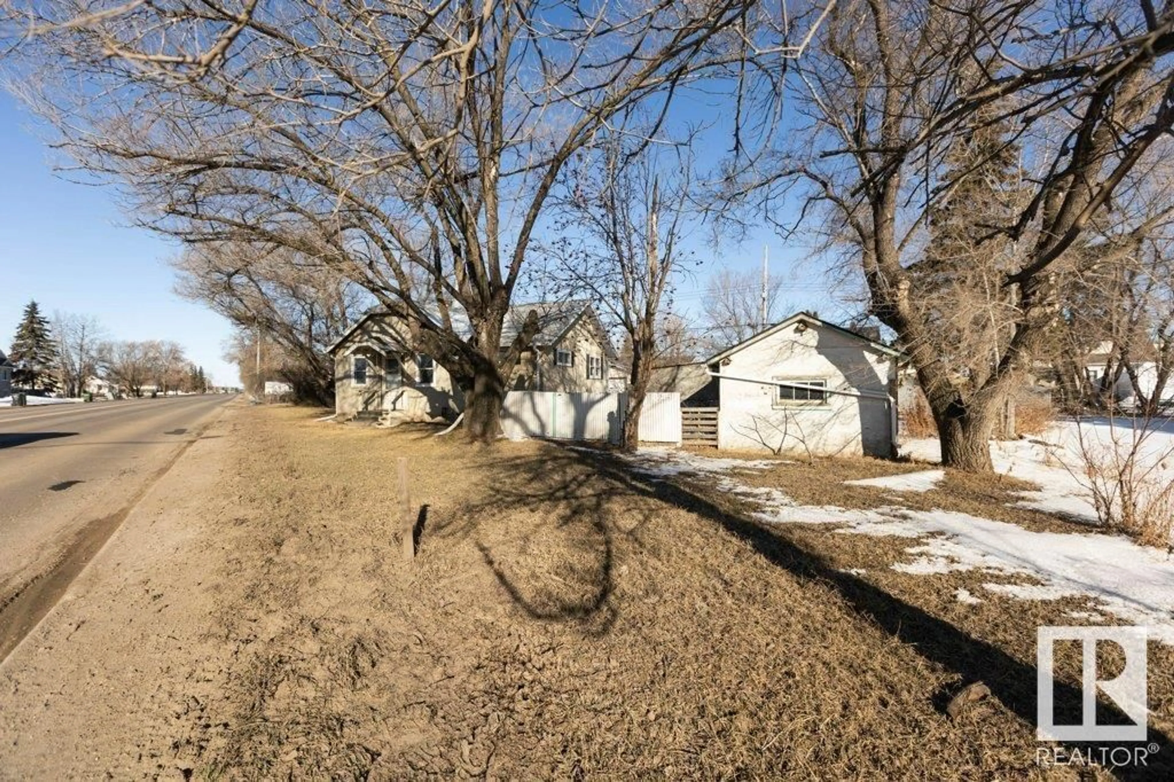 A pic from outside/outdoor area/front of a property/back of a property/a pic from drone, street for 9836 100 ST, Westlock Alberta T7P2R2