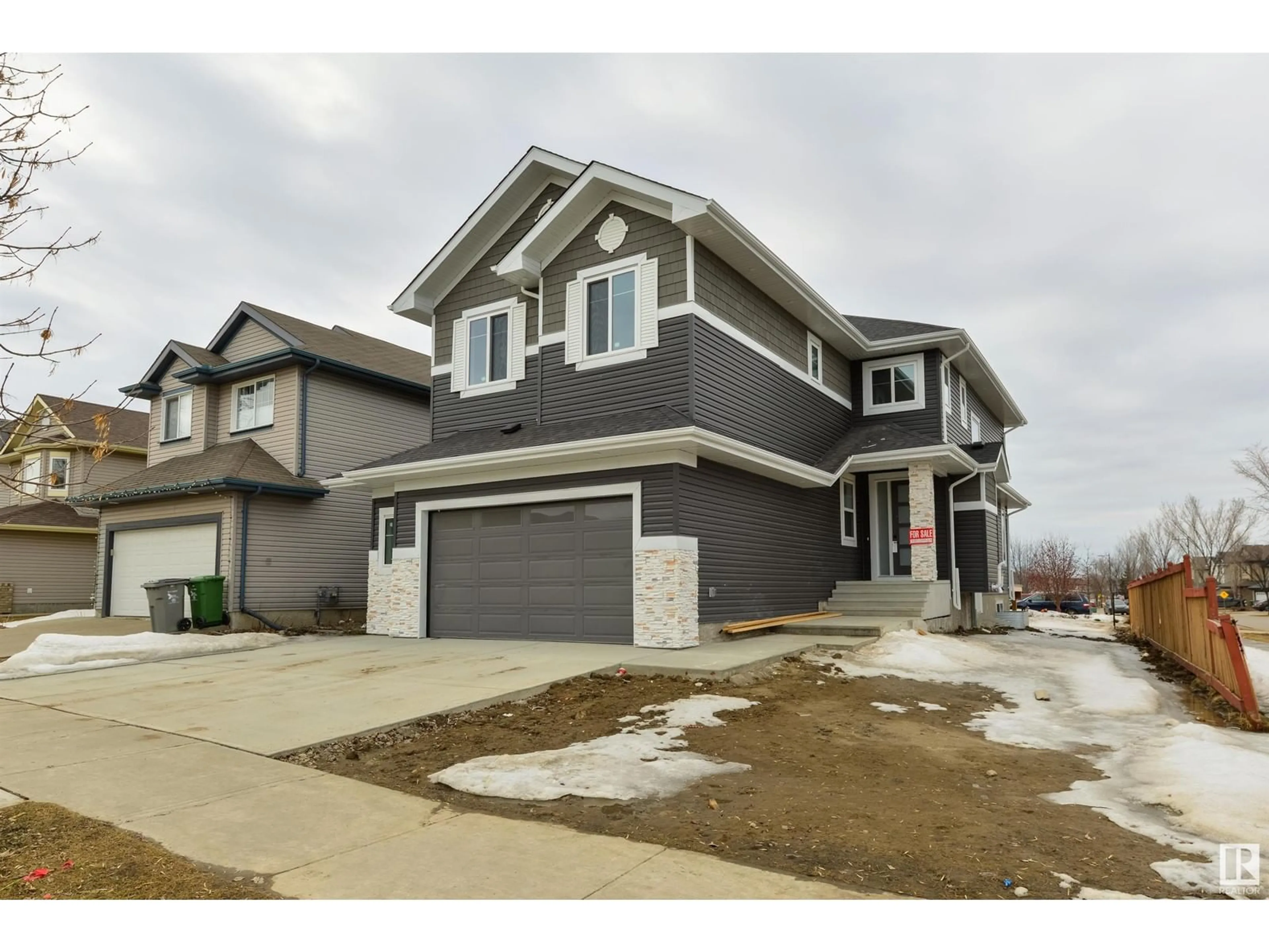Home with vinyl exterior material, street for 100 RUE MONETTE, Beaumont Alberta T4X1S8