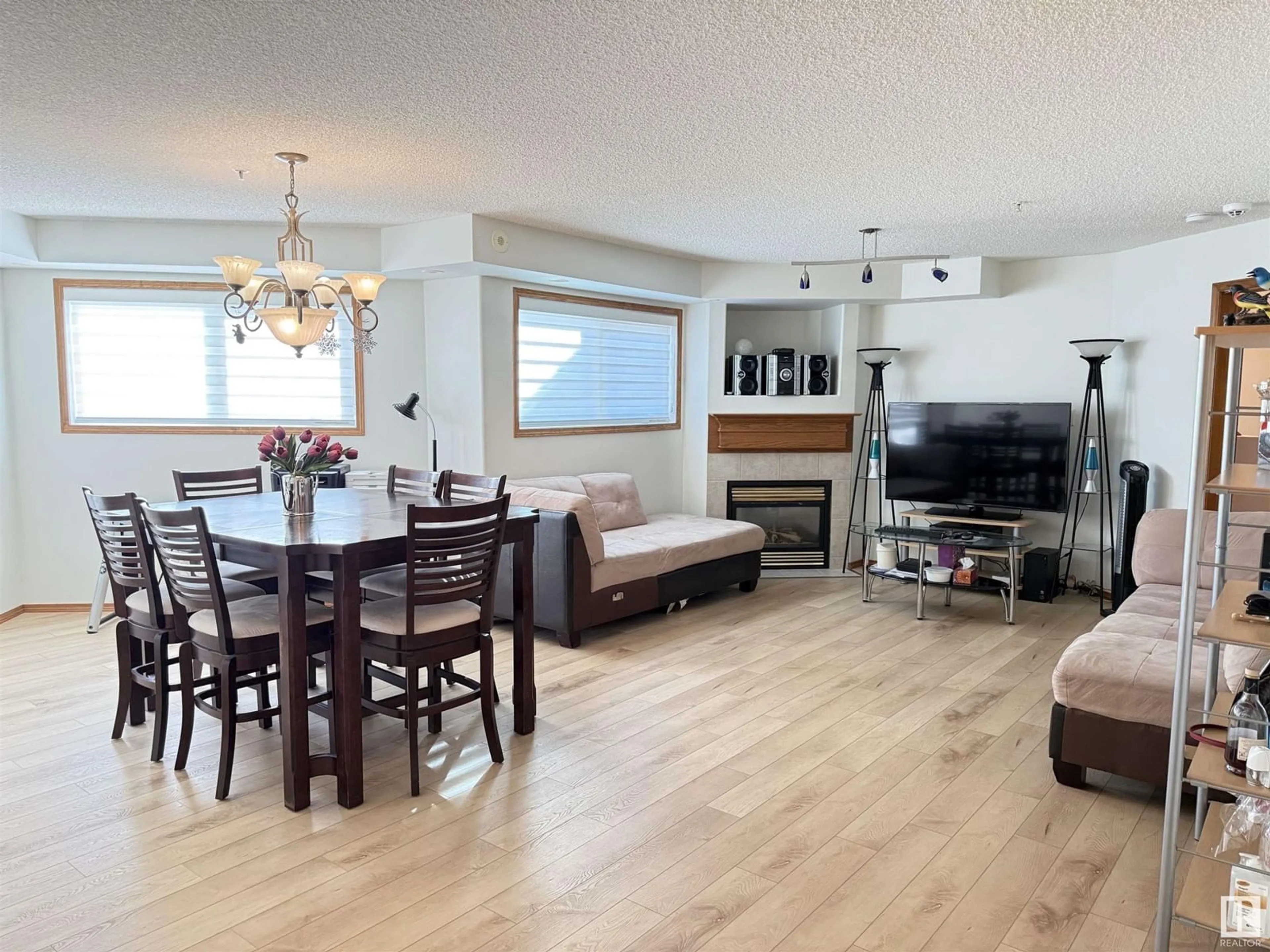 Living room with furniture, wood/laminate floor for #107 - 7839 96 ST, Edmonton Alberta T6C4R3