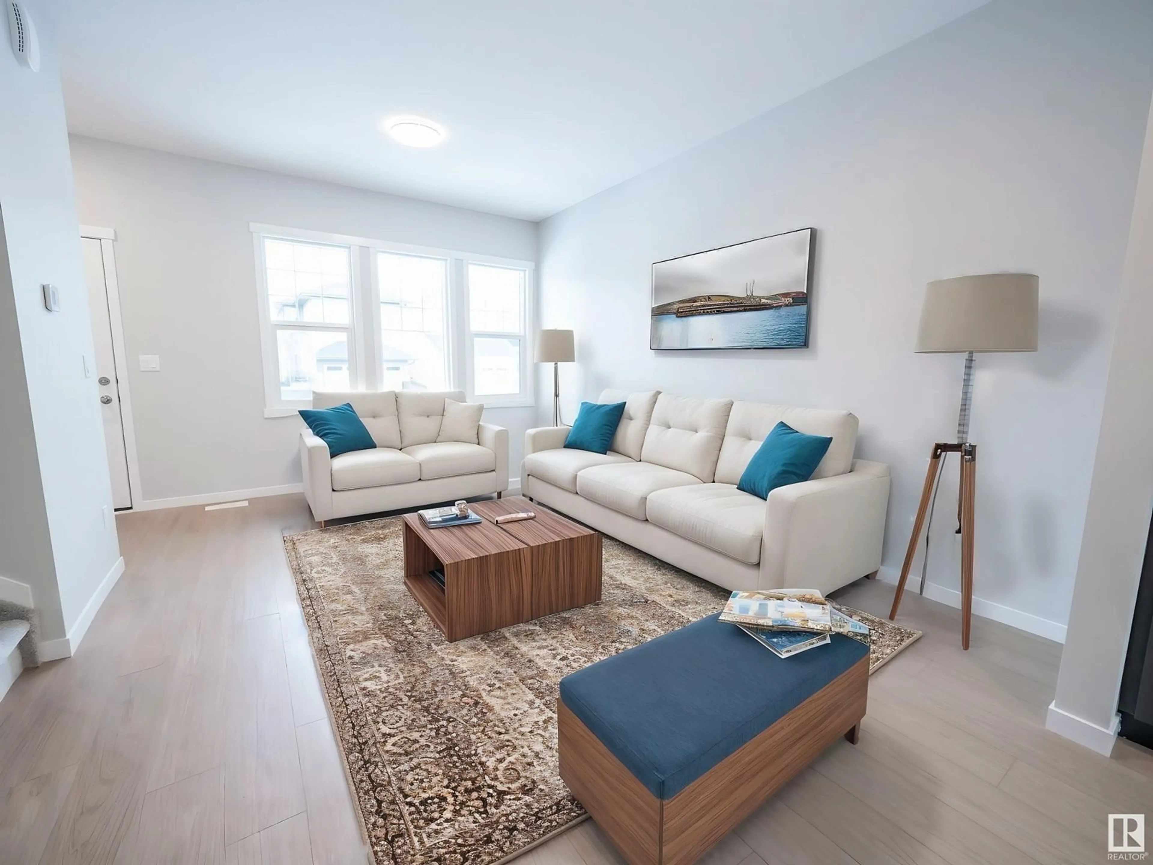 Living room with furniture, wood/laminate floor for NW - 17674 69 A ST, Edmonton Alberta T5Z0W8