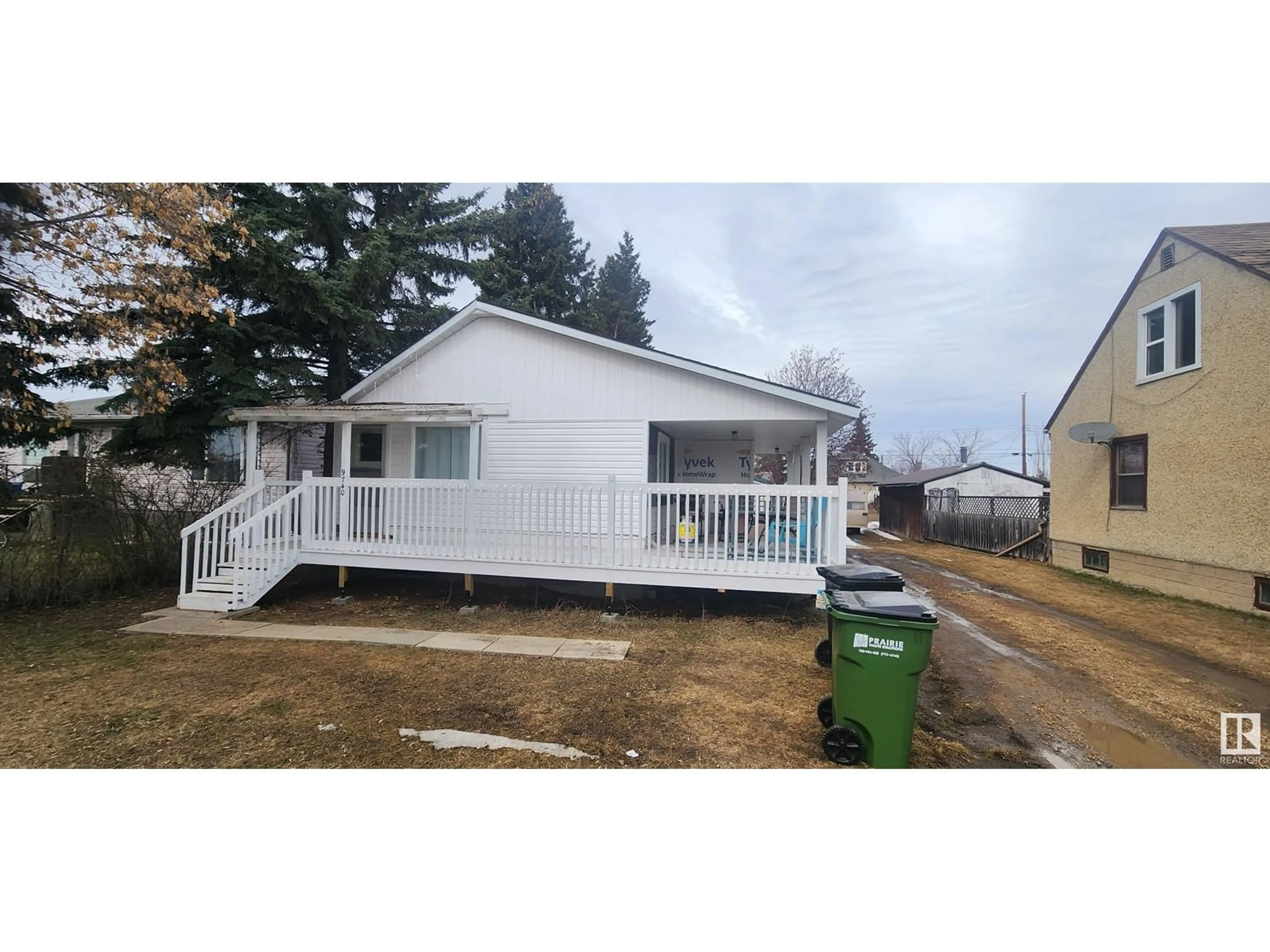 Home with vinyl exterior material, street for 9740 109 ST, Westlock Alberta T7P1P9