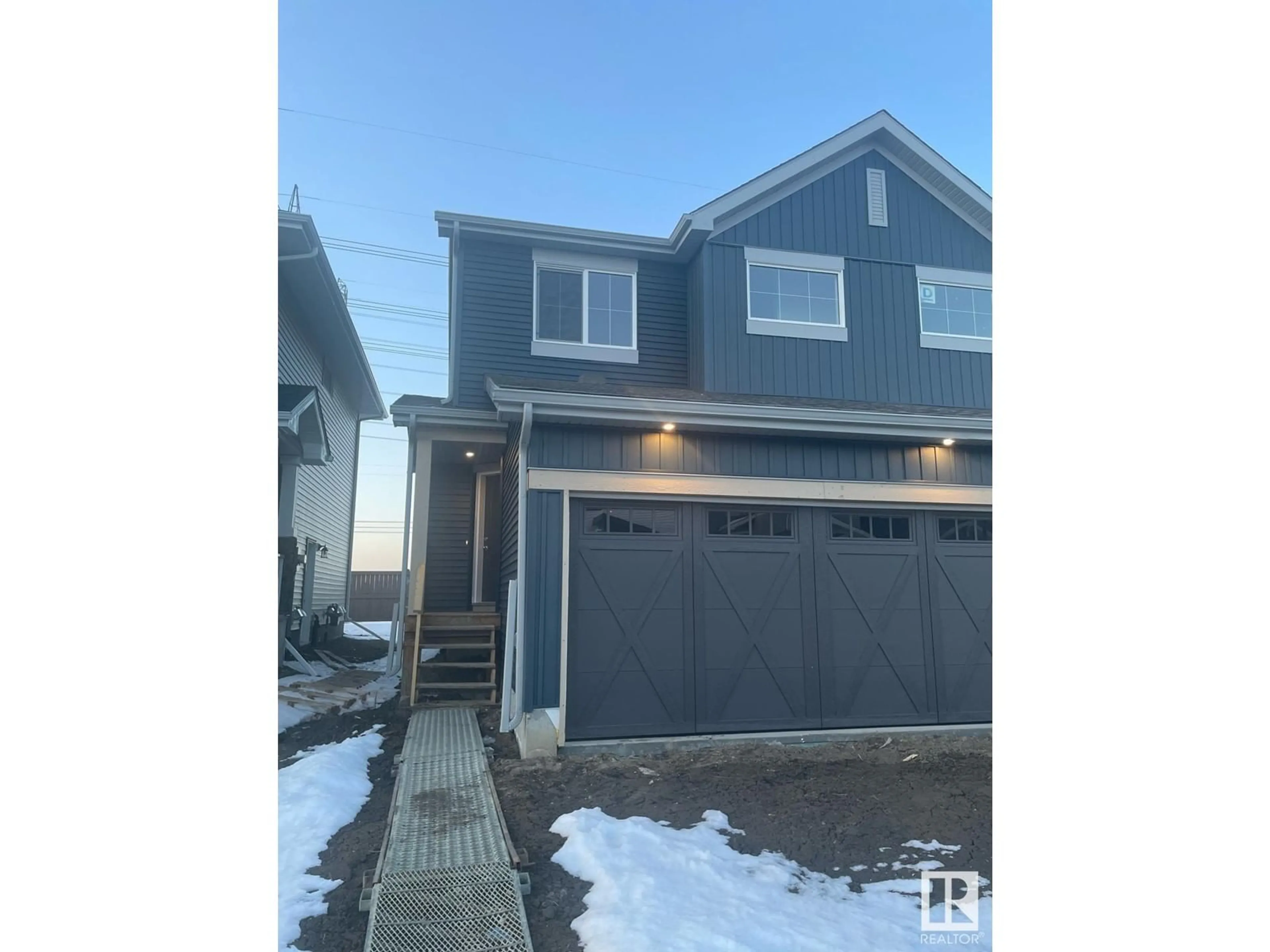 Home with vinyl exterior material, street for 19130 29 AV, Edmonton Alberta T6M3B5