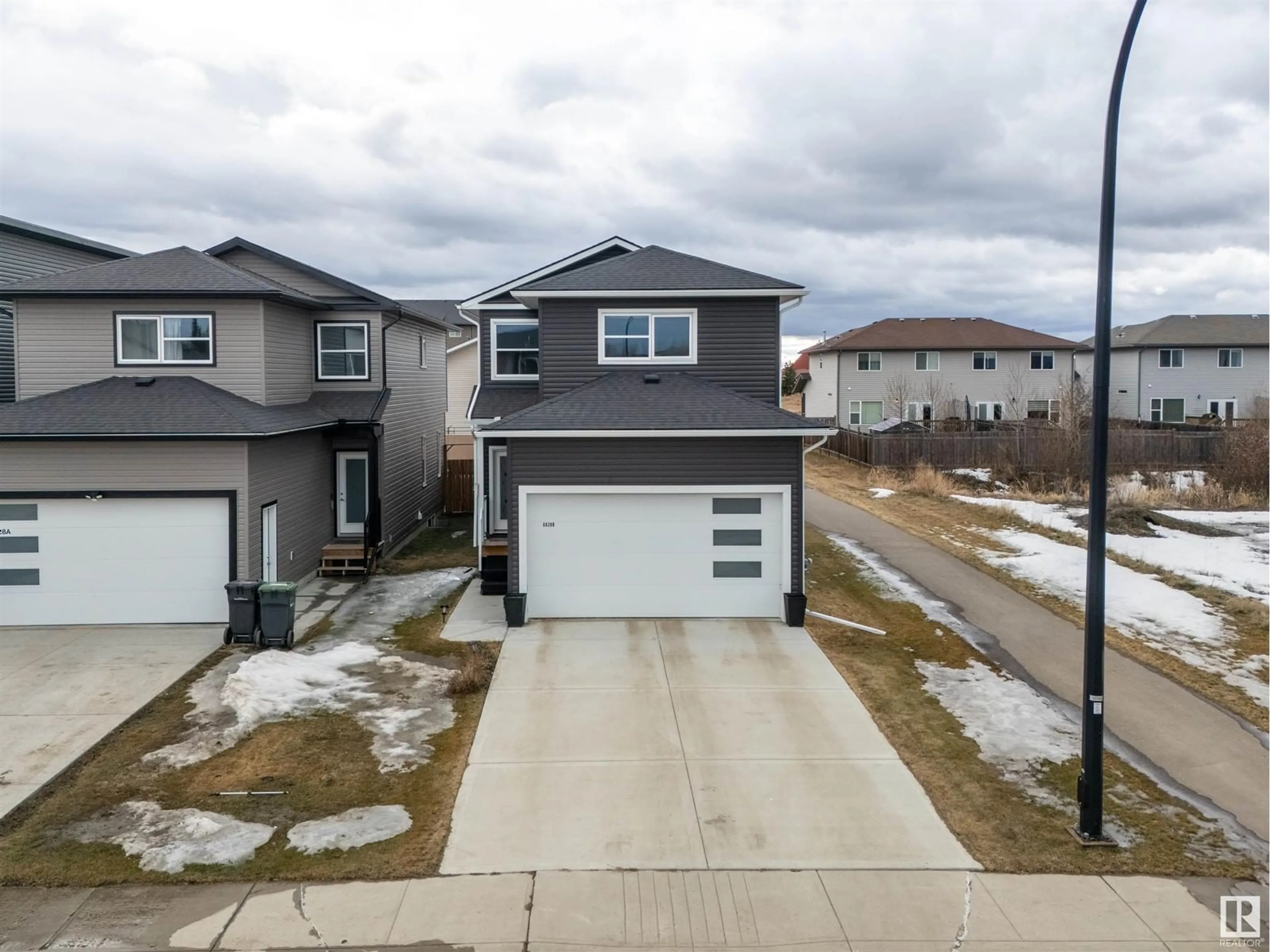 A pic from outside/outdoor area/front of a property/back of a property/a pic from drone, street for 6828B TRI CITY WY, Cold Lake Alberta T9M0L3
