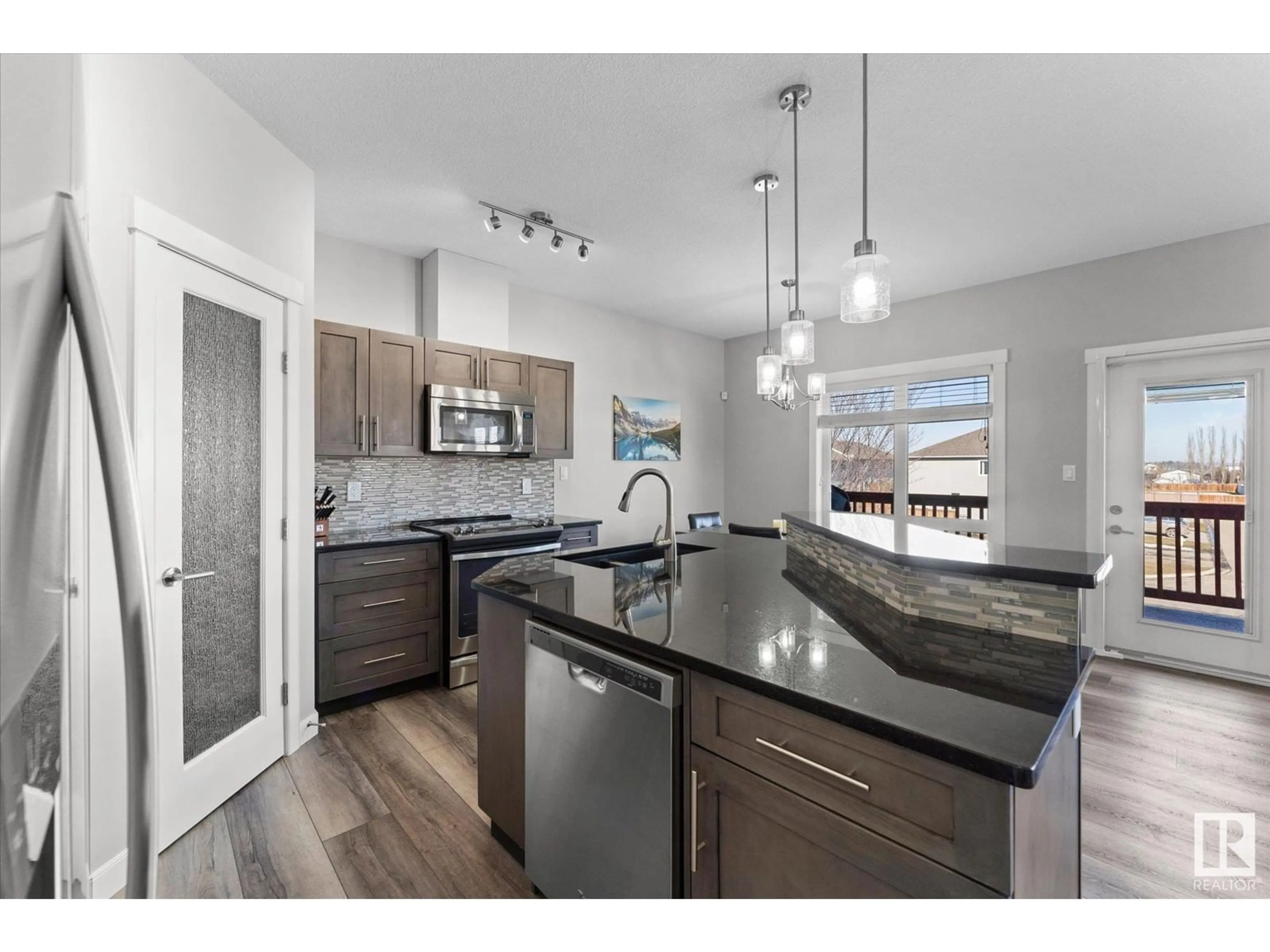Open concept kitchen, unknown for 1803 GRAYBRIAR GR, Stony Plain Alberta T7Z0G1