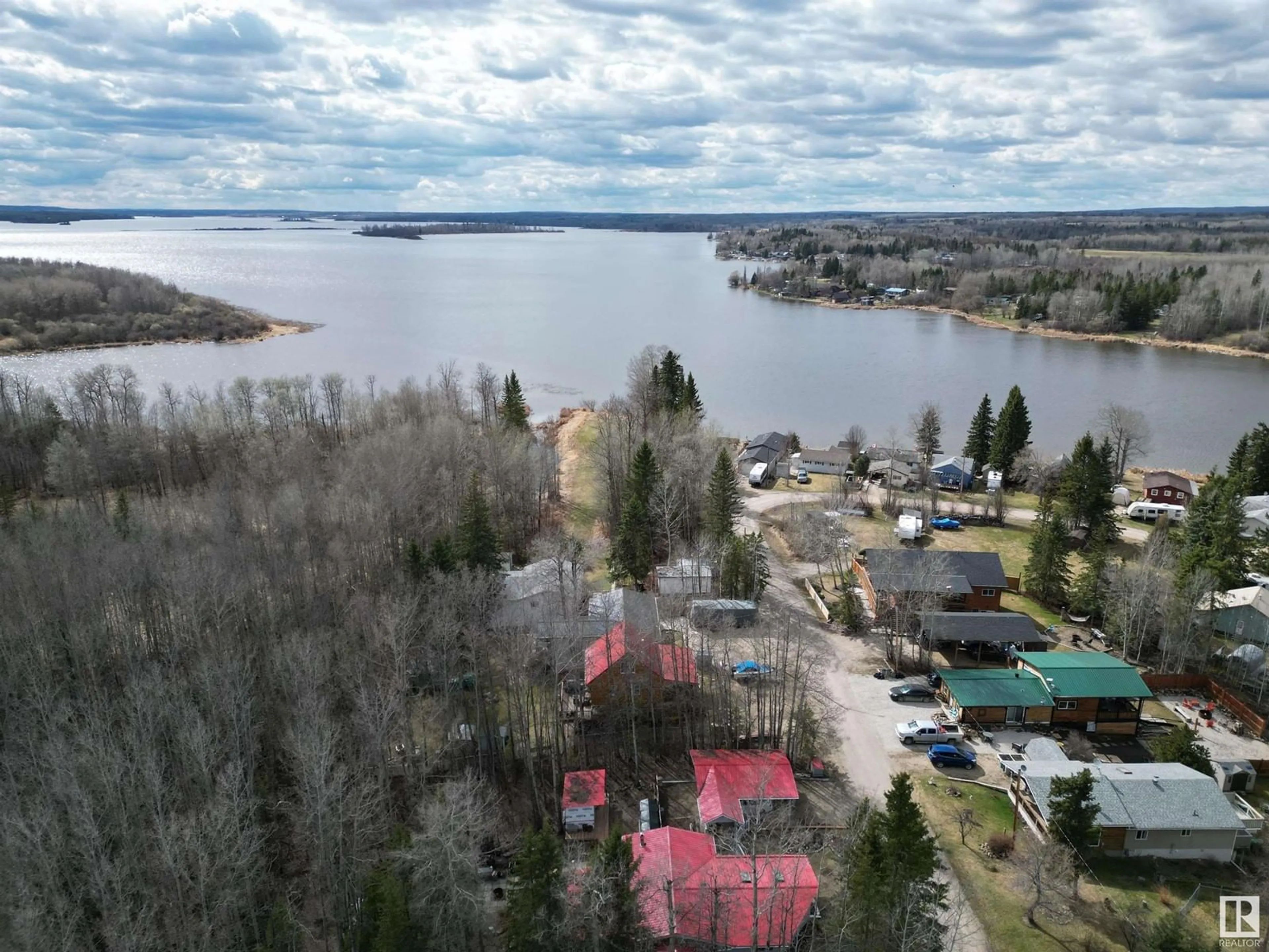 A pic from outside/outdoor area/front of a property/back of a property/a pic from drone, water/lake/river/ocean view for 54114 RGE RD 52, Rural Lac Ste. Anne County Alberta T0E1H0