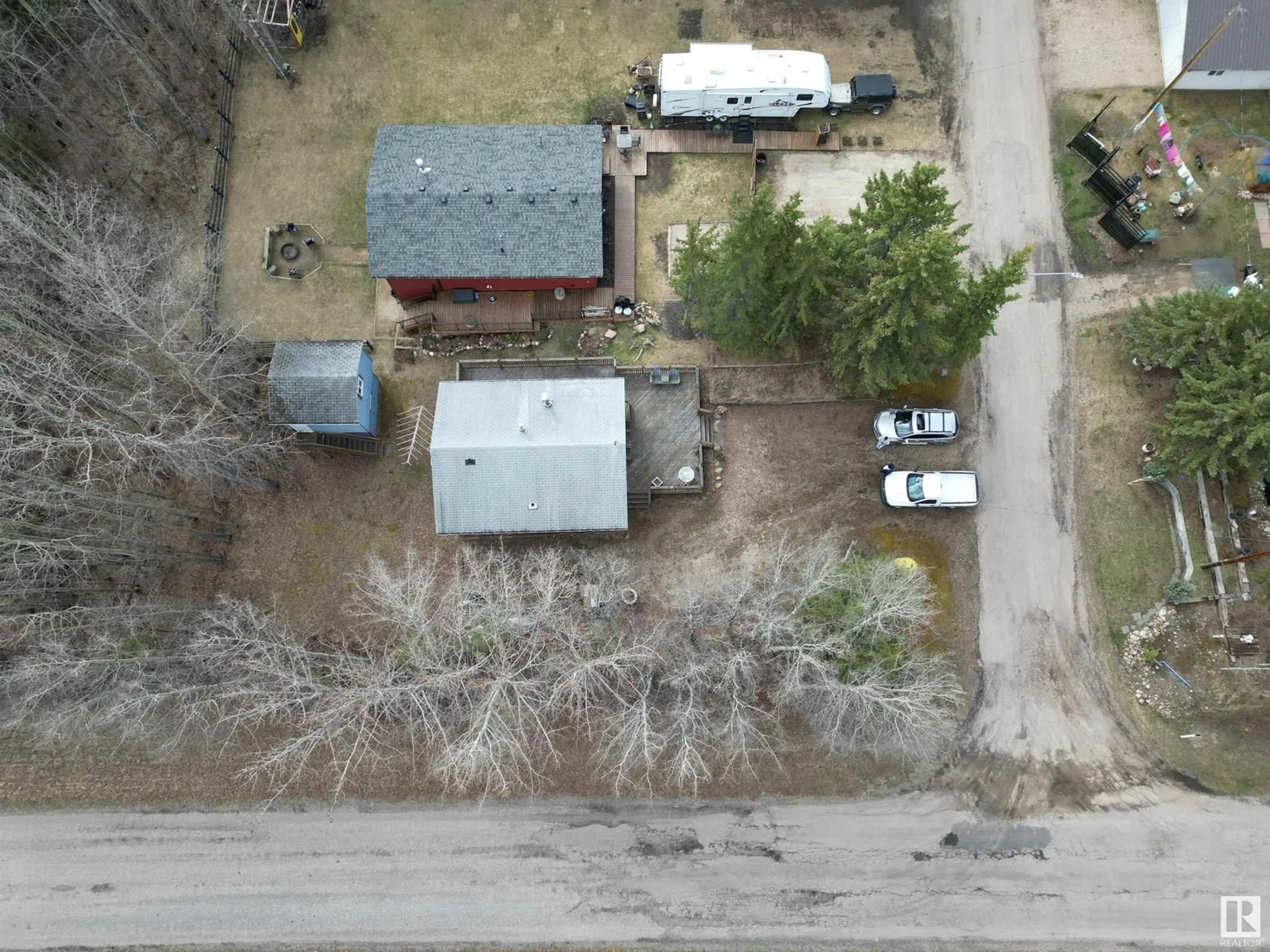 A pic from outside/outdoor area/front of a property/back of a property/a pic from drone, street for 54114 RGE RD 52, Rural Lac Ste. Anne County Alberta T0E1H0