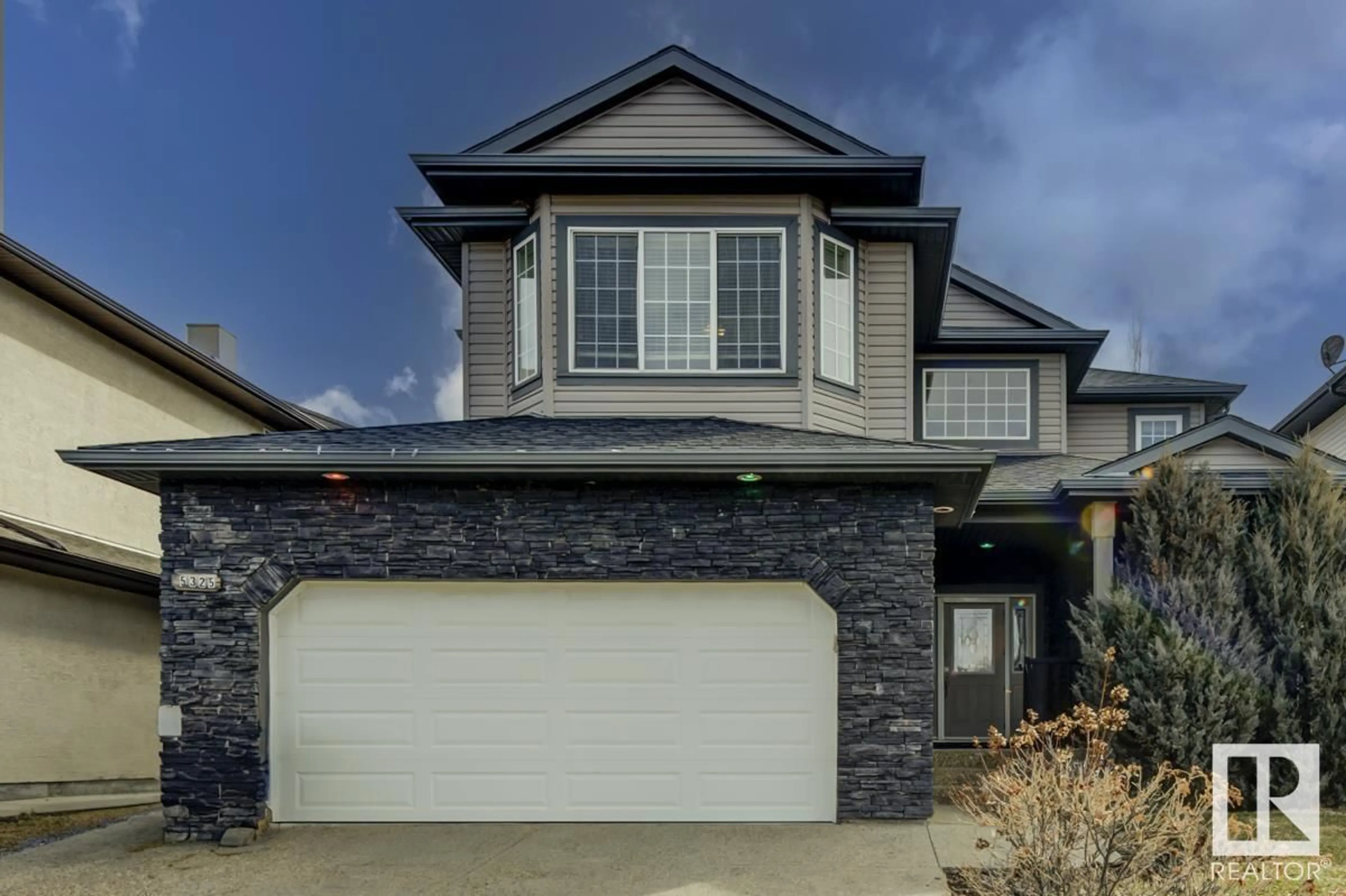 Home with vinyl exterior material, street for 5325 60 ST, Beaumont Alberta T4X0B2
