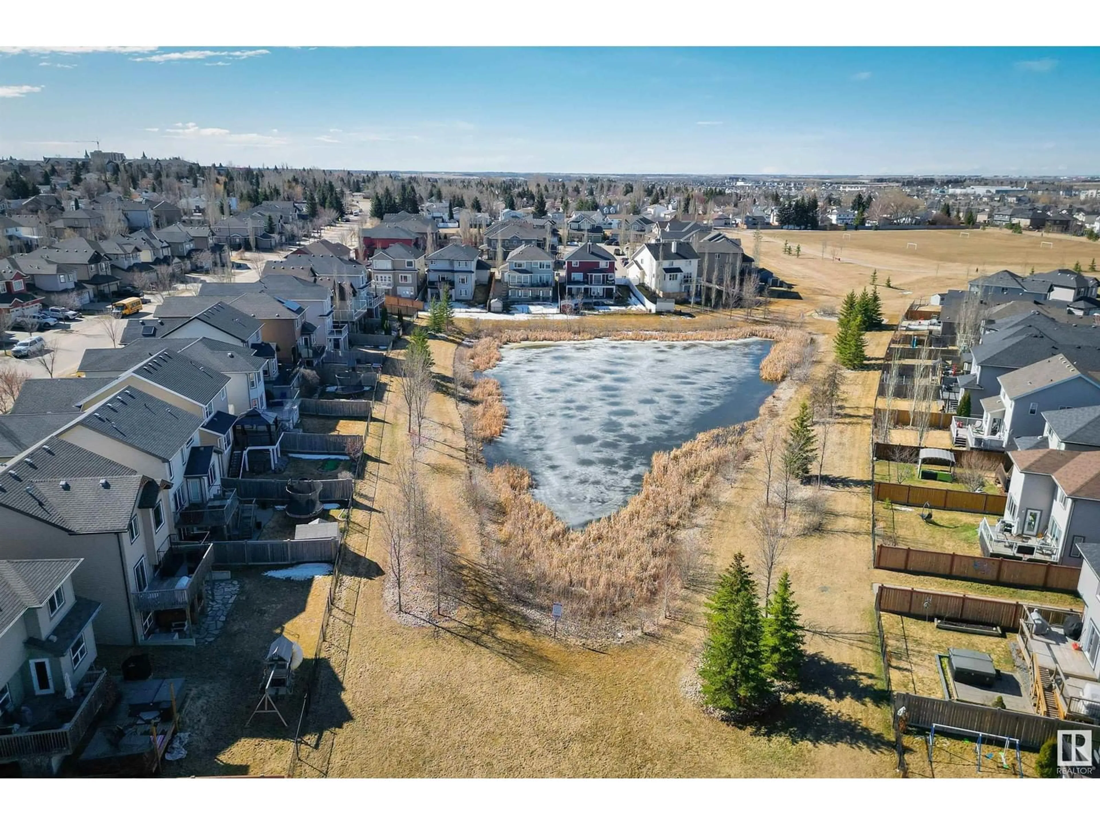 A pic from outside/outdoor area/front of a property/back of a property/a pic from drone, water/lake/river/ocean view for 5742 56A ST, Beaumont Alberta T4X0G1