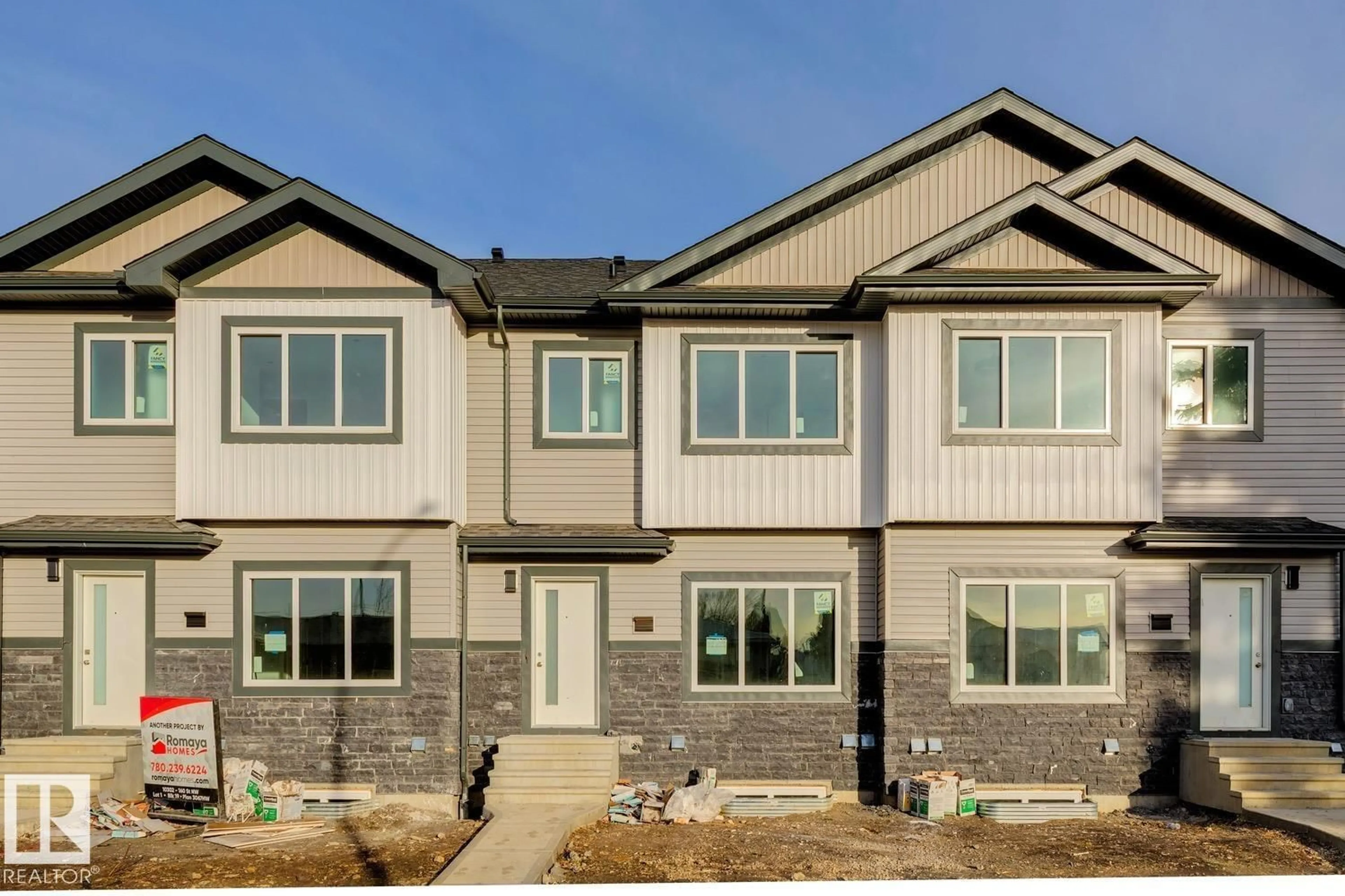 Home with vinyl exterior material, street for 16003 103 AV, Edmonton Alberta T5P3G3